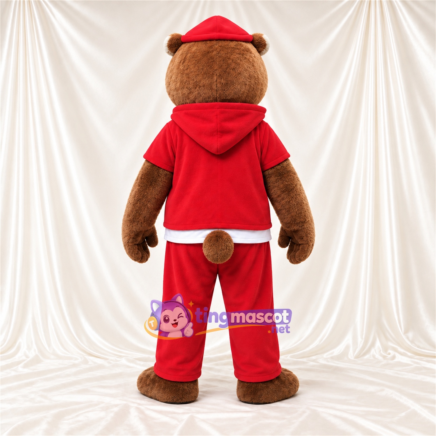 Costume de mascotte Loutre – marron – Survêtement (rouge); Casquette Costume de mascotte Loutre – marron – Survêtement (rouge); Casquette