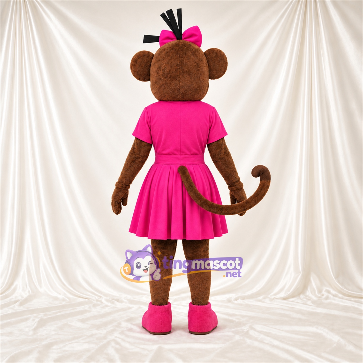 Maskottchenkostüm Affe – braun – Kleid (rosa); Schleife Maskottchenkostüm Affe – braun – Kleid (rosa); Schleife