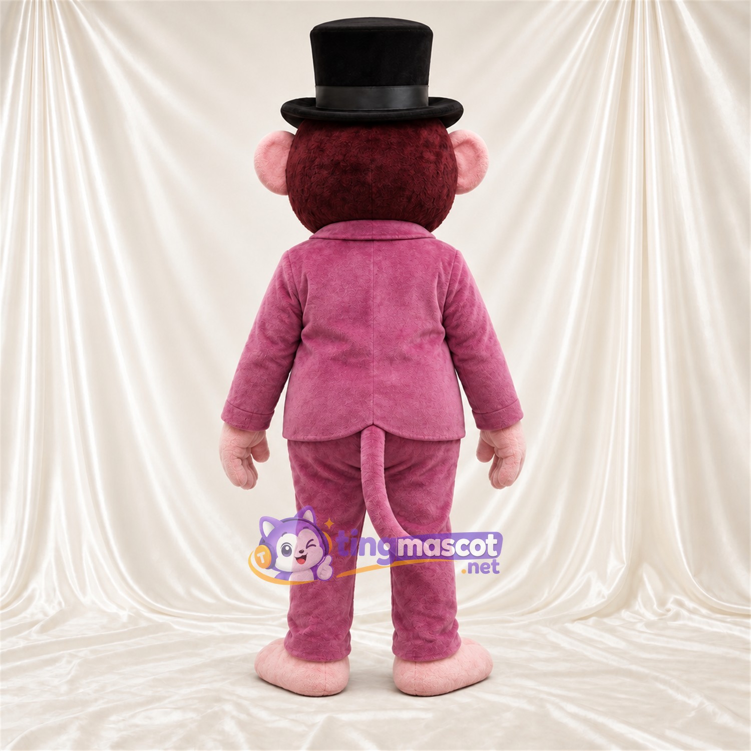 Maskottchenkostüm Affe – braun – Anzug (rosa); Fliege (rot) Maskottchenkostüm Affe – braun – Anzug (rosa); Fliege (rot)