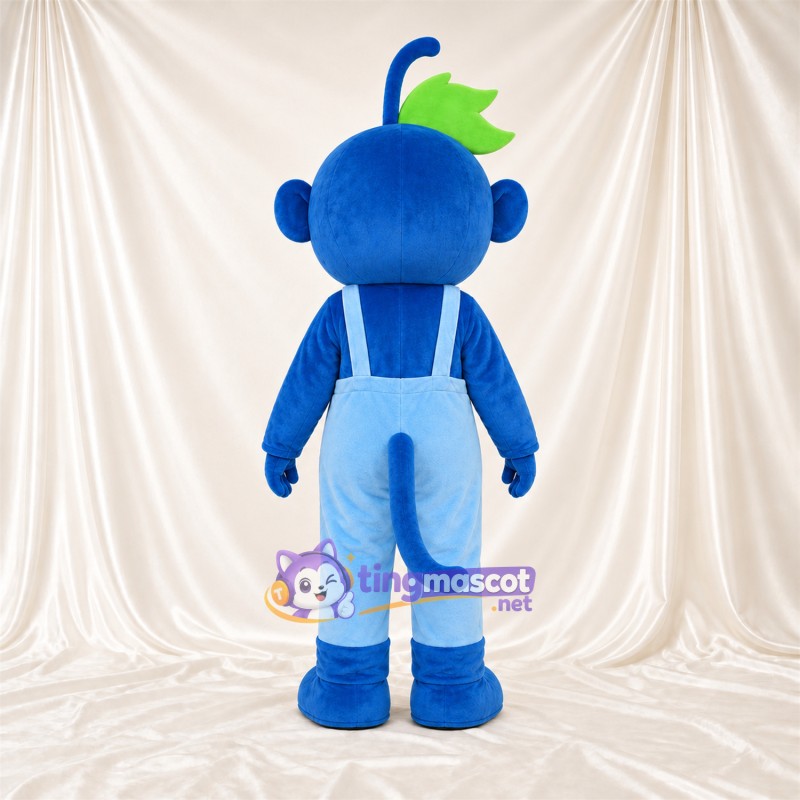Costume de mascotte Singe – bleu – Salopette (bleu clair); Feuilles au sommet (vert) Costume de mascotte Singe – bleu – Salopette (bleu clair); Feuilles au sommet (vert)