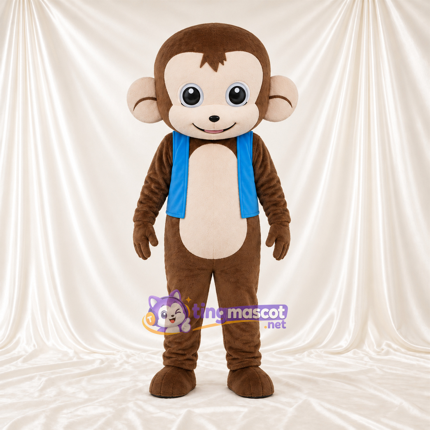 Maskottchenkostüm Affe – braun – Weste (blau); Bauch (creme) Maskottchenkostüm Affe – braun – Weste (blau); Bauch (creme)