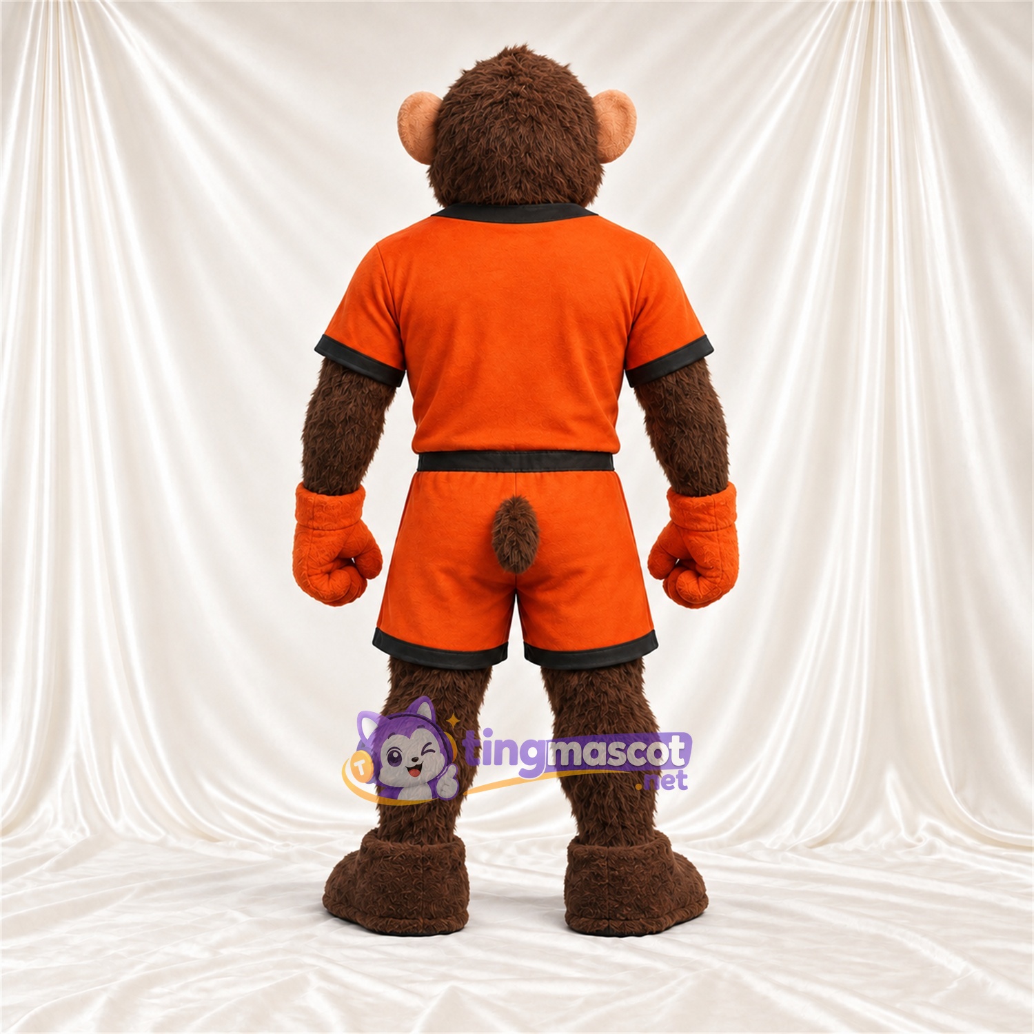 Maskottchenkostüm Affe – braun – Sporttrikot (orange / schwarz) Maskottchenkostüm Affe – braun – Sporttrikot (orange / schwarz)