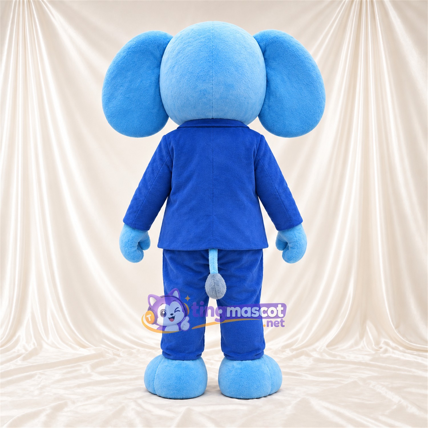 Blue Elephant Mascot Costume - Blue Suit and Yellow Tie Blue Elephant Mascot Costume - Blue Suit and Yellow Tie