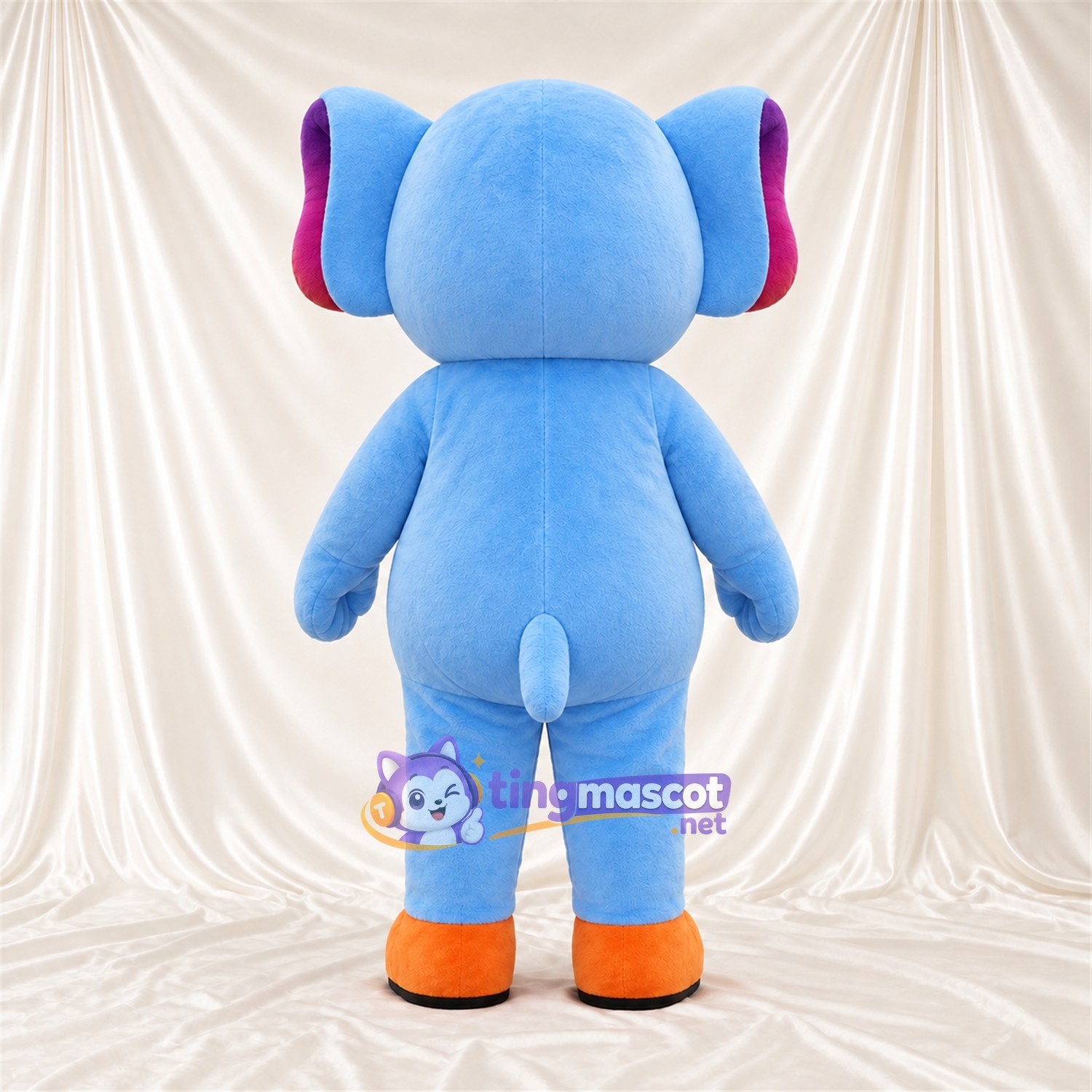 Maskottchenkostüm Elefant – blau – Ohreninnenseiten (violett); Füße (orange) Maskottchenkostüm Elefant – blau – Ohreninnenseiten (violett); Füße (orange)