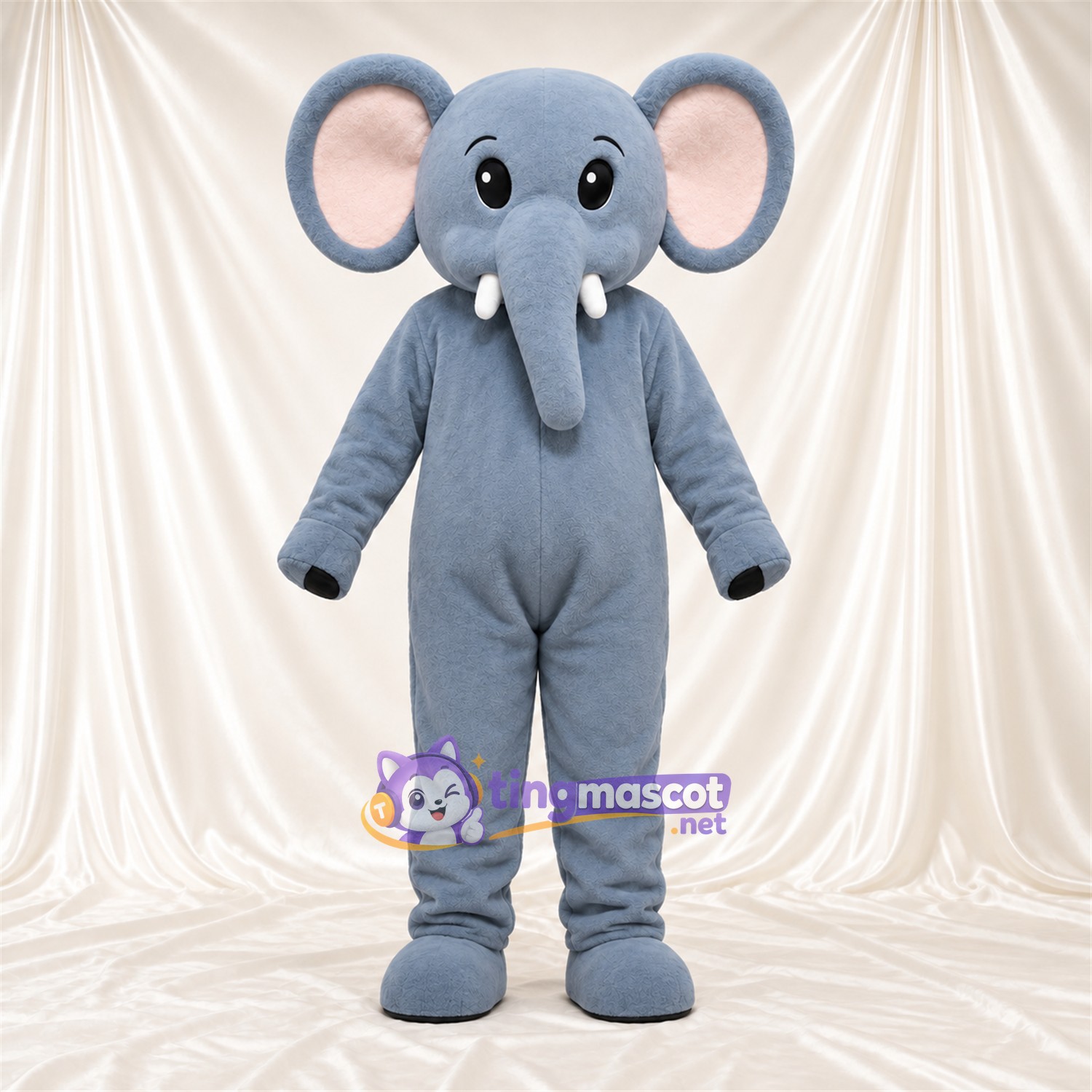 Maskottchenkostüm Elefant – blau – Ohreninnenseiten (rosa); Stoßzähne (weiß) Maskottchenkostüm Elefant – blau – Ohreninnenseiten (rosa); Stoßzähne (weiß)