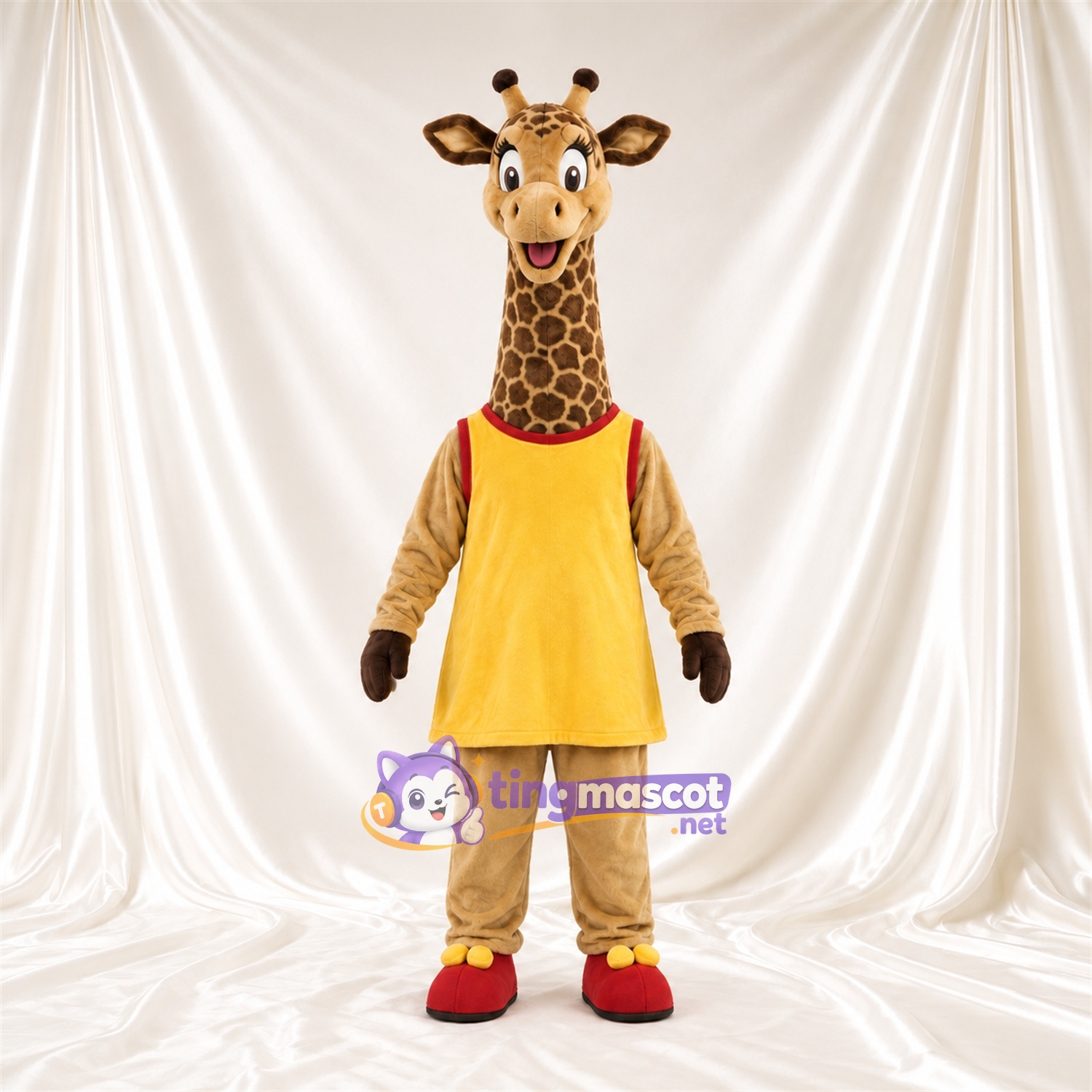 Maskottchenkostüm Giraffe – braun / creme – Tunika (gelb) Maskottchenkostüm Giraffe – braun / creme – Tunika (gelb)