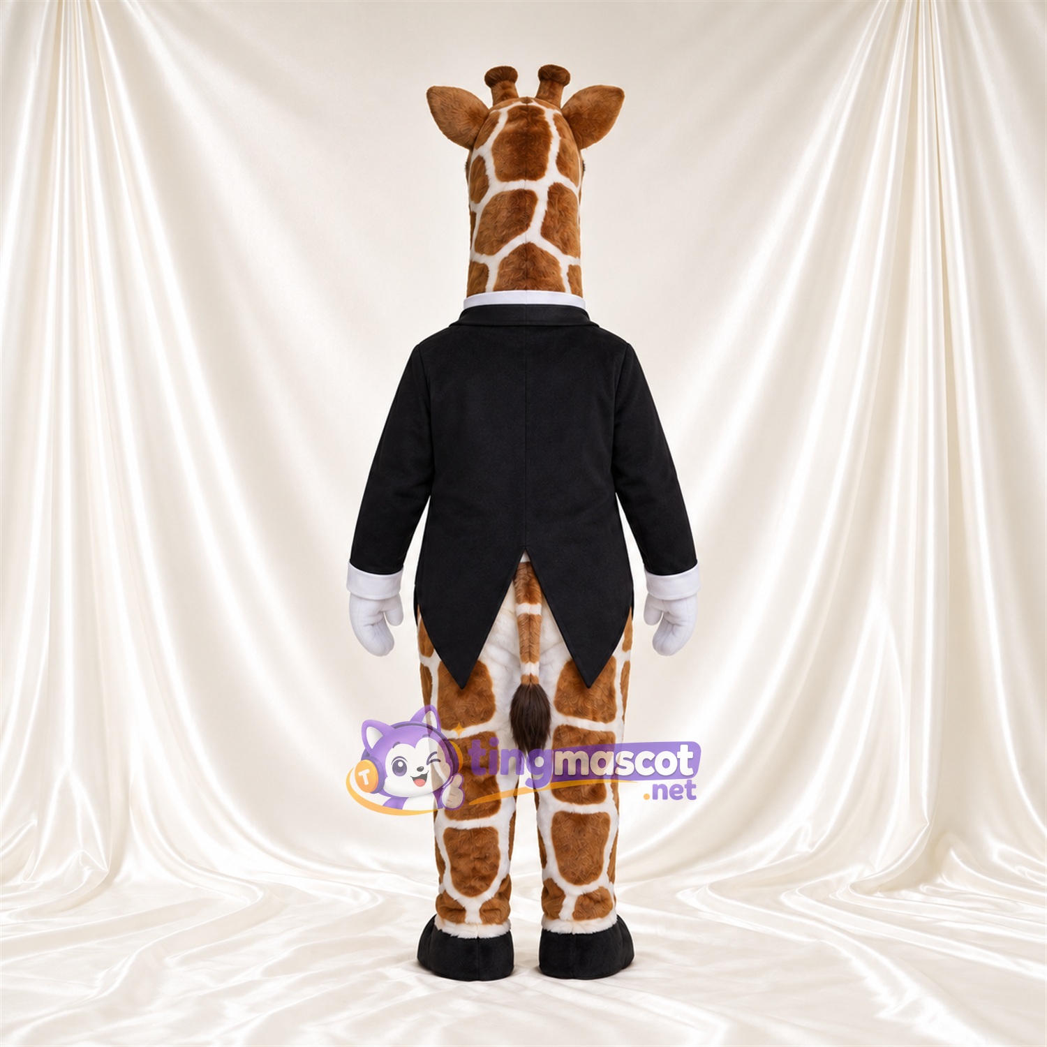 Brown and Cream Giraffe Mascot Costume - Black Jacket and Bow Tie Brown and Cream Giraffe Mascot Costume - Black Jacket and Bow Tie
