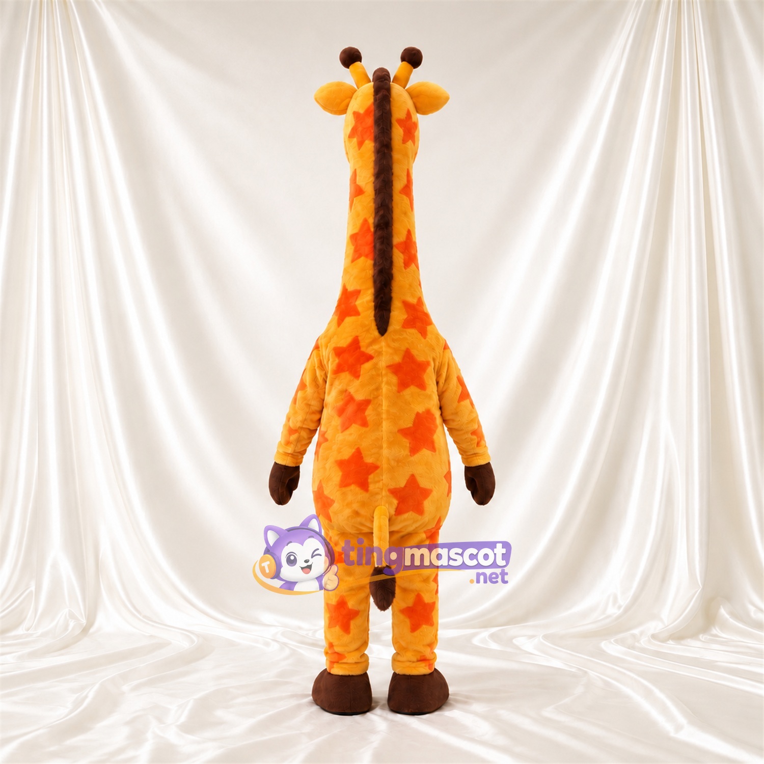 Maskottchenkostüm Giraffe – gelb / orange – Hufe (braun); Sternenmuster Maskottchenkostüm Giraffe – gelb / orange – Hufe (braun); Sternenmuster