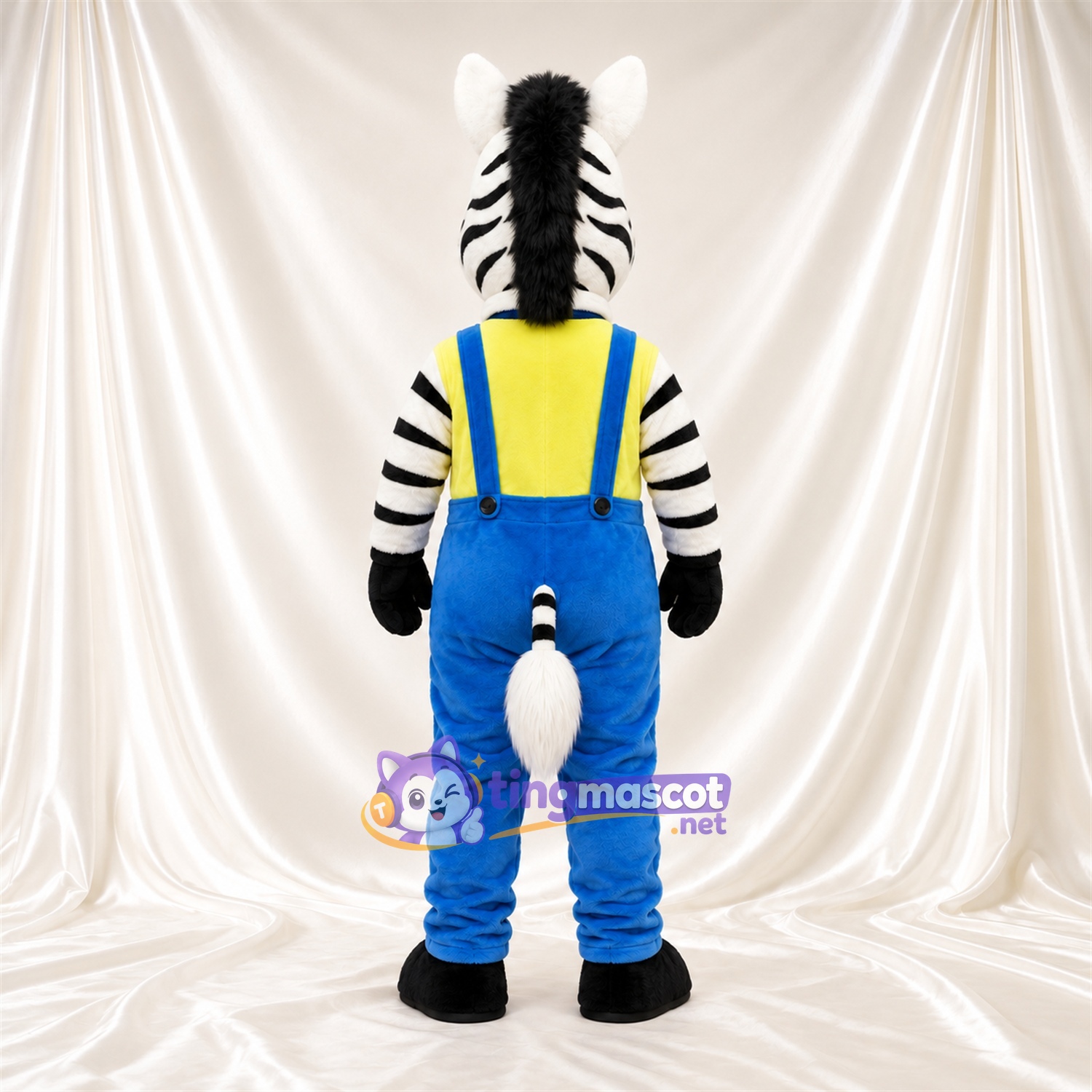 Black and White Zebra Mascot Costume - Blue Overalls and Yellow Shirt Black and White Zebra Mascot Costume - Blue Overalls and Yellow Shirt