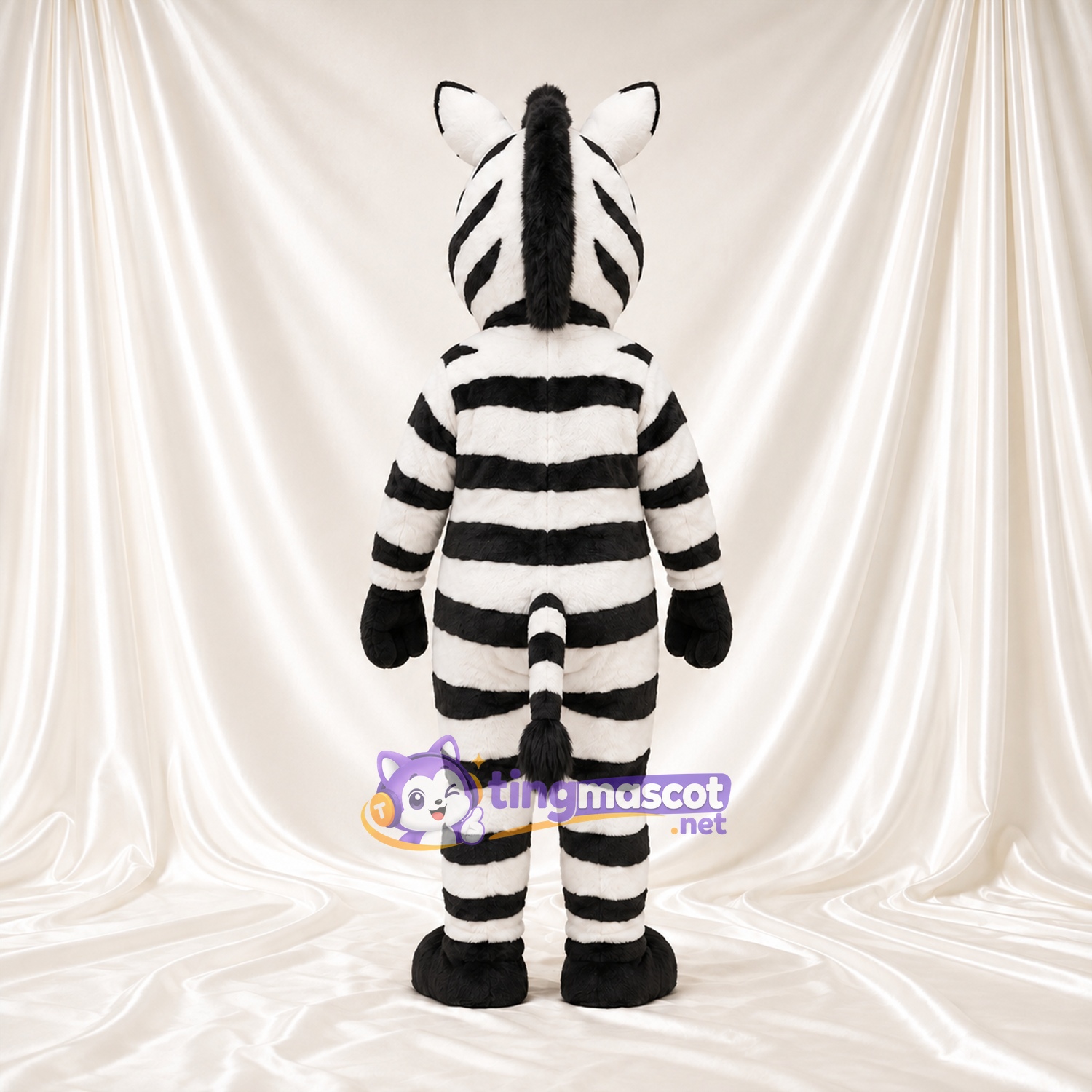 Maskottchenkostüm Zebra – schwarz / weiß – Breite Streifen; Zunge (rosa) Maskottchenkostüm Zebra – schwarz / weiß – Breite Streifen; Zunge (rosa)