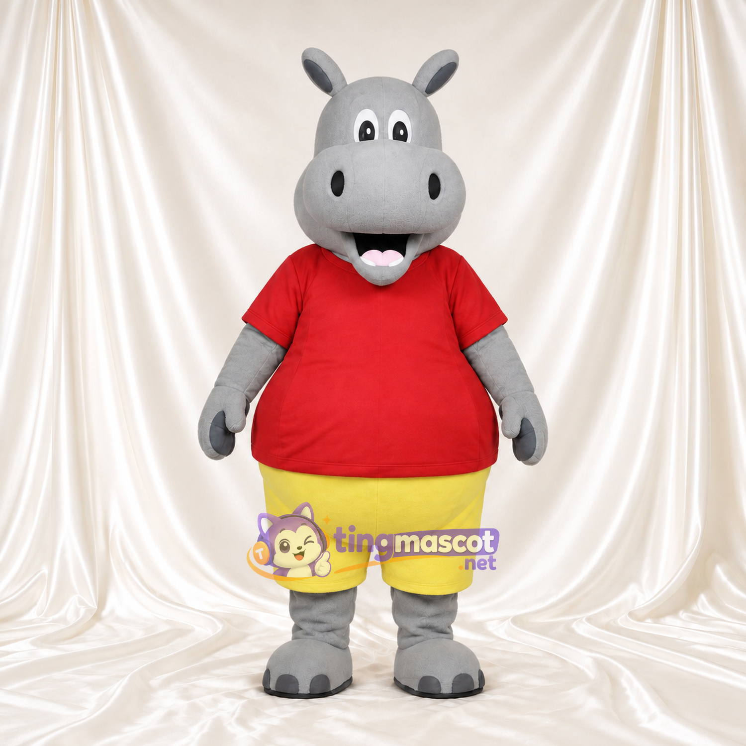 Costume de mascotte Hippopotame – gris – Chemise (rouge); Short (jaune) Costume de mascotte Hippopotame – gris – Chemise (rouge); Short (jaune)