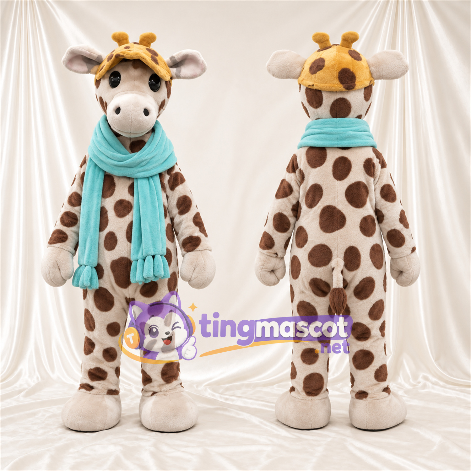 Costume de mascotte Girafe – marron / crème – Écharpe (turquoise) Costume de mascotte Girafe – marron / crème – Écharpe (turquoise)