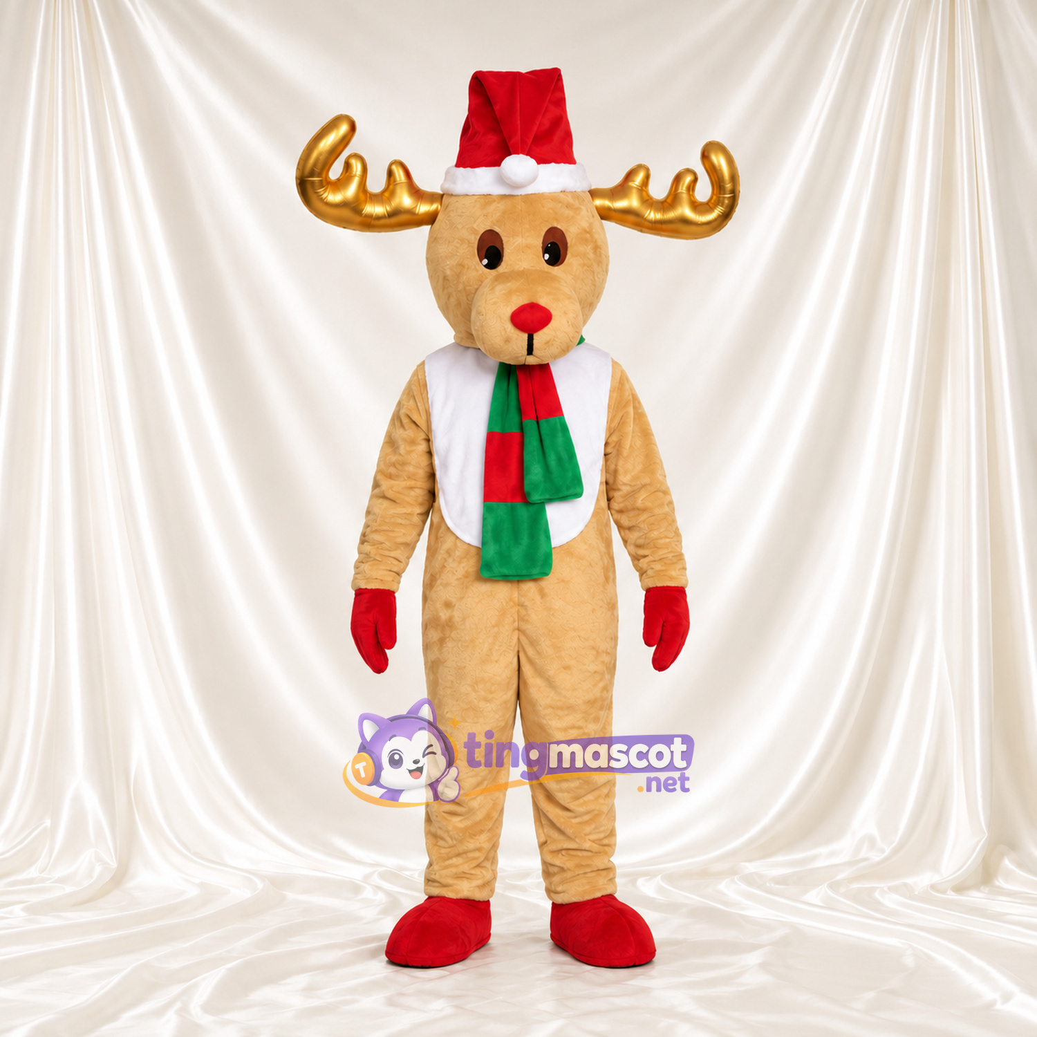 Costume de mascotte Renne – brun clair – Bonnet de Noël; Écharpe (vert / rouge) Costume de mascotte Renne – brun clair – Bonnet de Noël; Écharpe (vert / rouge)