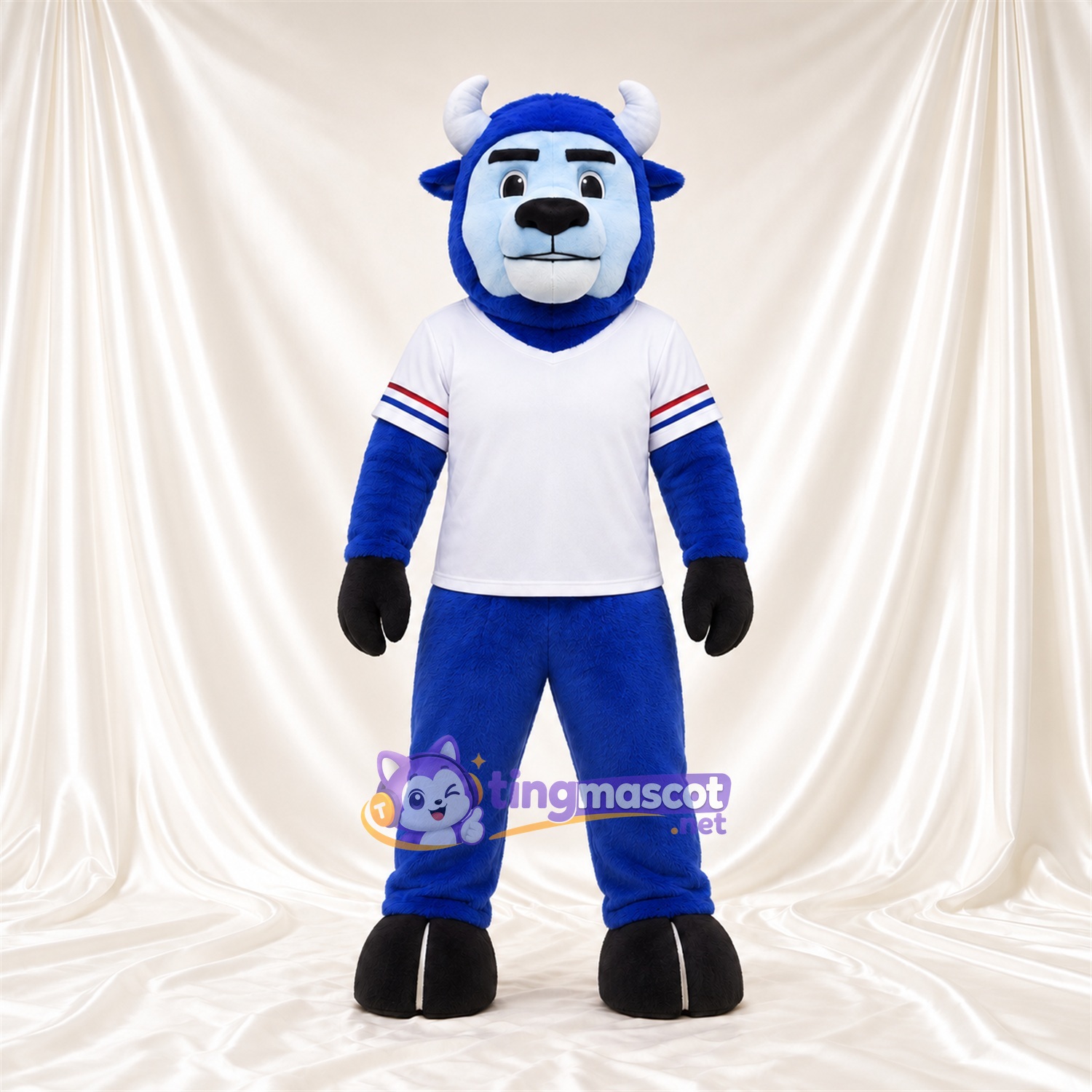 Maskottchenkostüm Bison – blau – Hörner (weiß); Trikot (weiß) Maskottchenkostüm Bison – blau – Hörner (weiß); Trikot (weiß)
