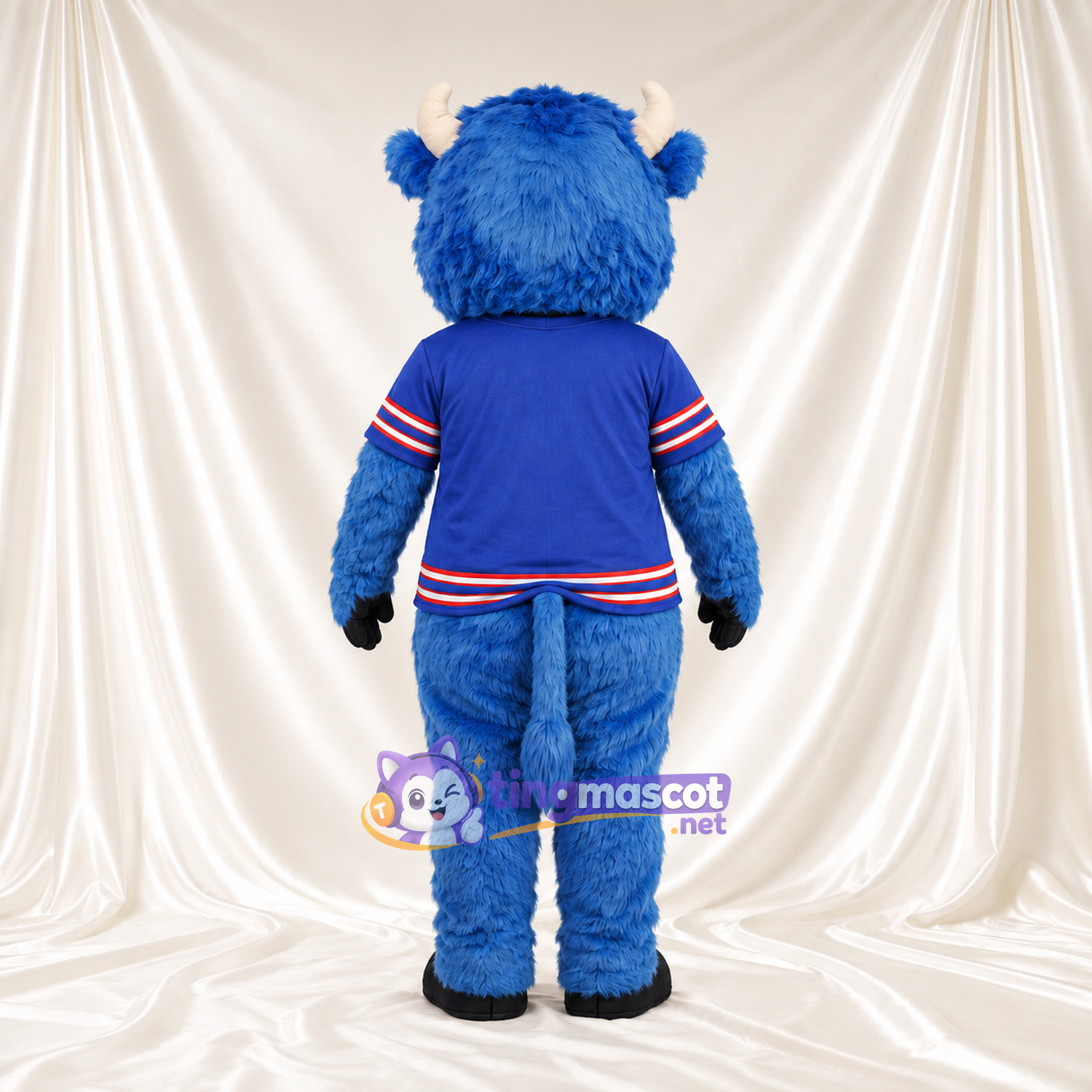 Maskottchenkostüm Bison – blau – Hörner (hellbraun); Trikot (blau) Maskottchenkostüm Bison – blau – Hörner (hellbraun); Trikot (blau)