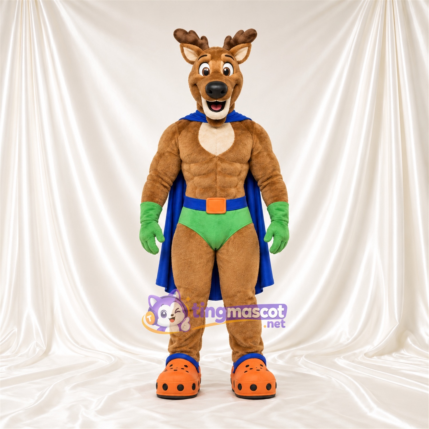 Costume de mascotte Cerf super-héros – marron – Cape (bleu); Gants (vert) Costume de mascotte Cerf super-héros – marron – Cape (bleu); Gants (vert)