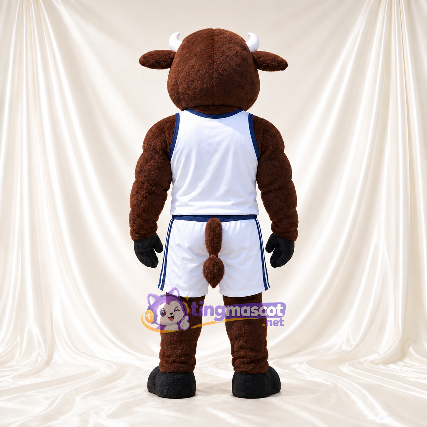 Maskottchenkostüm Bison – braun – Basketballtrikot (weiß); Hörner (schwarz) Maskottchenkostüm Bison – braun – Basketballtrikot (weiß); Hörner (schwarz)