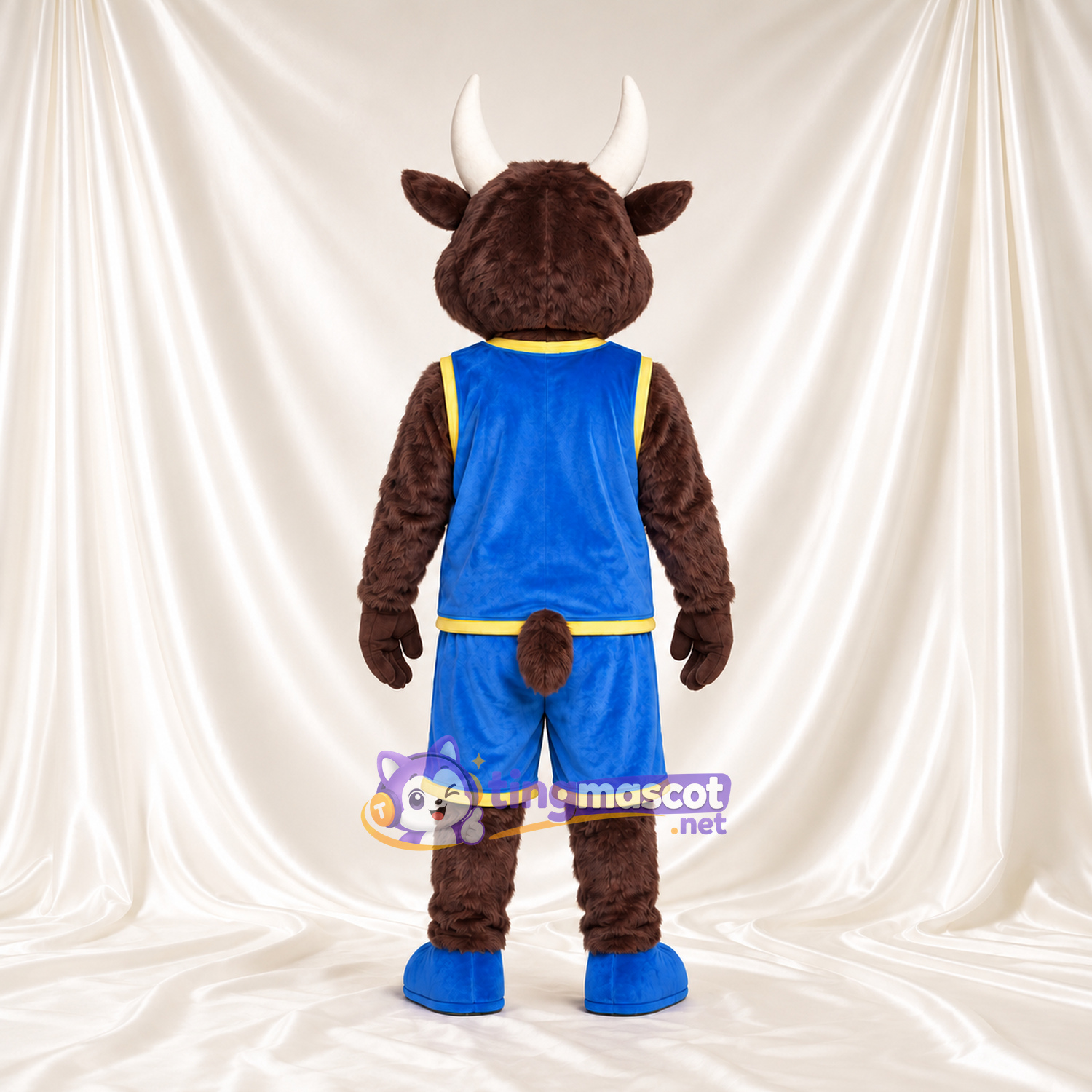 Maskottchenkostüm Bison – braun – Basketballtrikot (blau) Maskottchenkostüm Bison – braun – Basketballtrikot (blau)