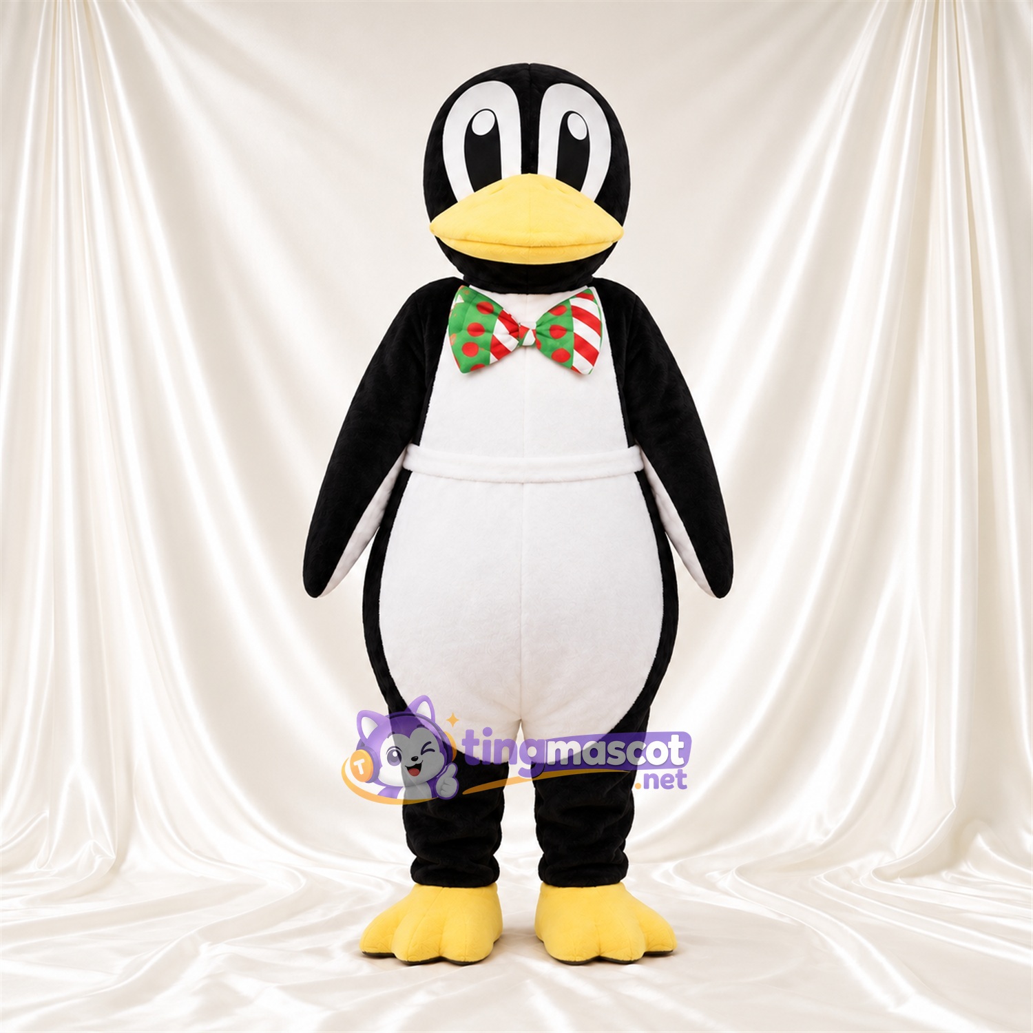 Costume de mascotte Pingouin – noir / blanc – Nœud papillon Costume de mascotte Pingouin – noir / blanc – Nœud papillon