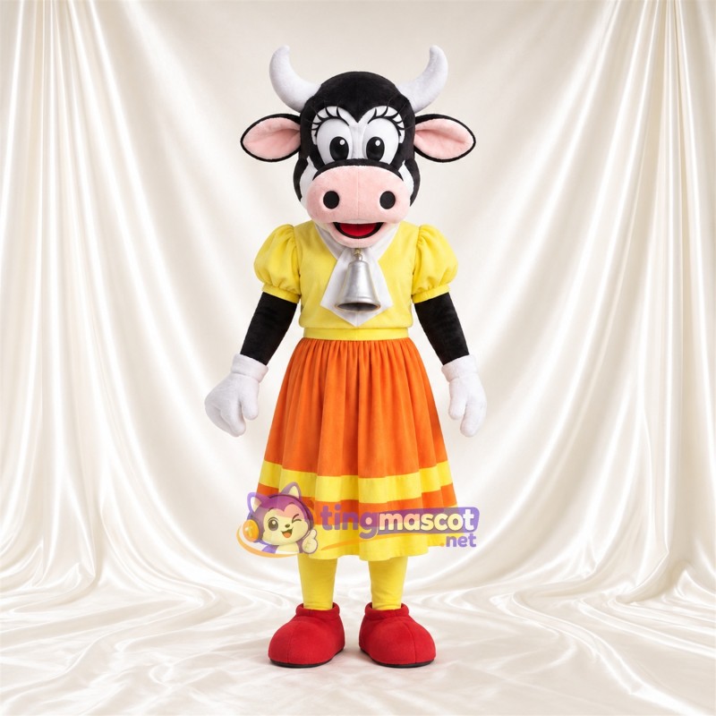 Costume de mascotte Vache – noir / blanc – Chemisier (jaune); Jupe (orange) Costume de mascotte Vache – noir / blanc – Chemisier (jaune); Jupe (orange)
