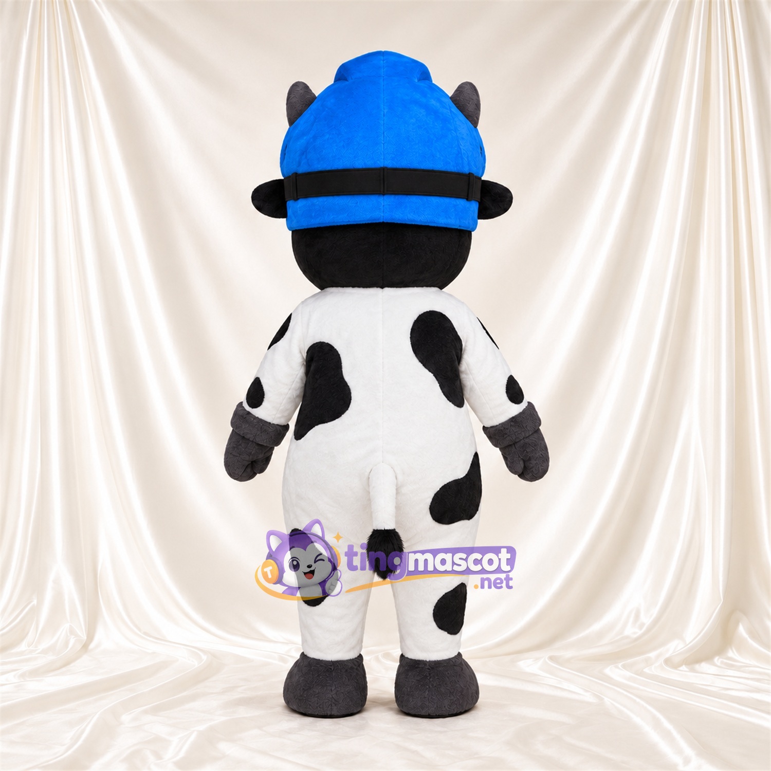 Black and White Cow Mascot Costume - Blue Helmet Orange Goggles Black and White Cow Mascot Costume - Blue Helmet Orange Goggles