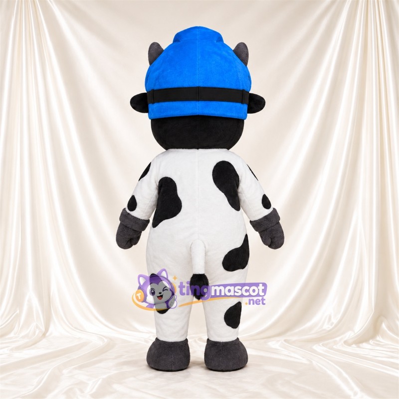 Black and White Cow Mascot Costume - Blue Helmet Orange Goggles Black and White Cow Mascot Costume - Blue Helmet Orange Goggles