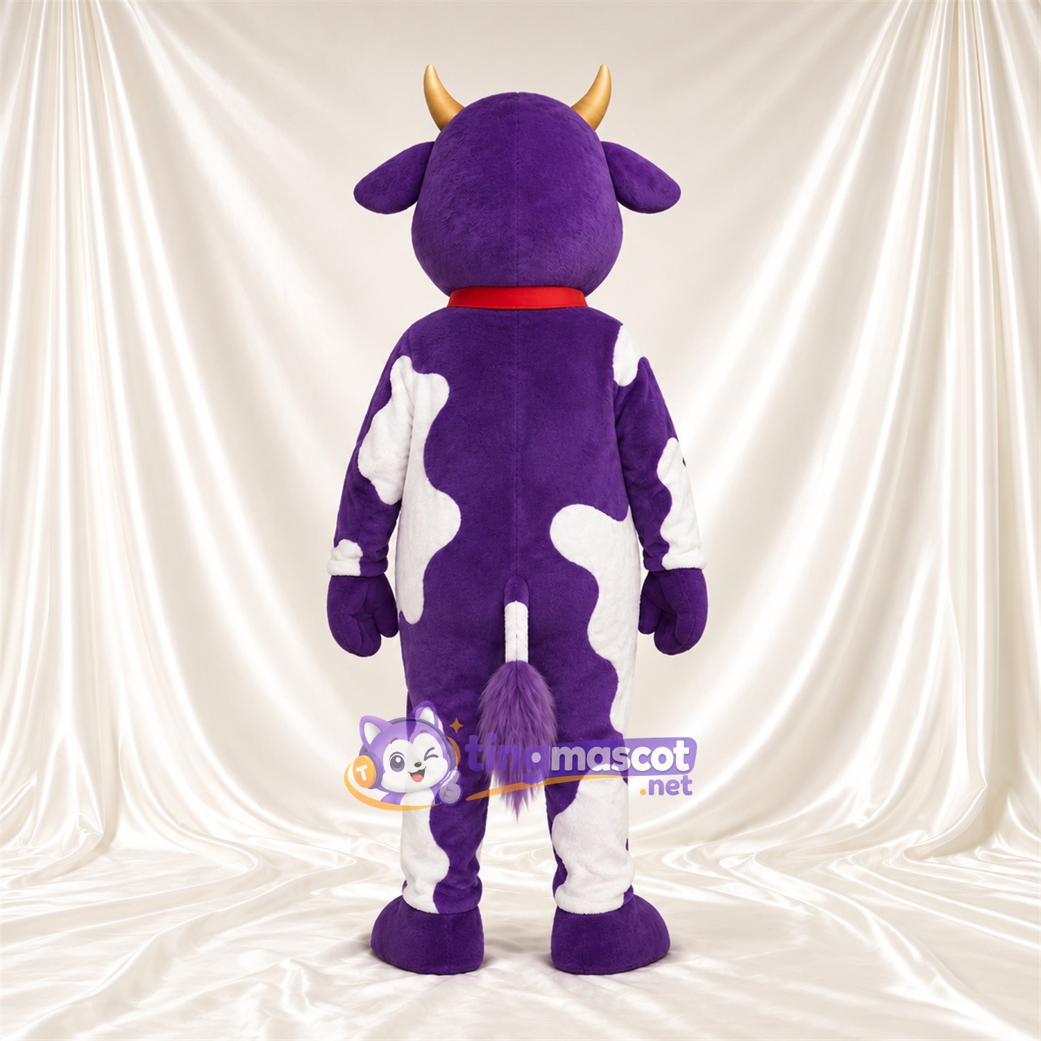 Costume de mascotte Vache – violet / blanc – Collier à clochette Costume de mascotte Vache – violet / blanc – Collier à clochette