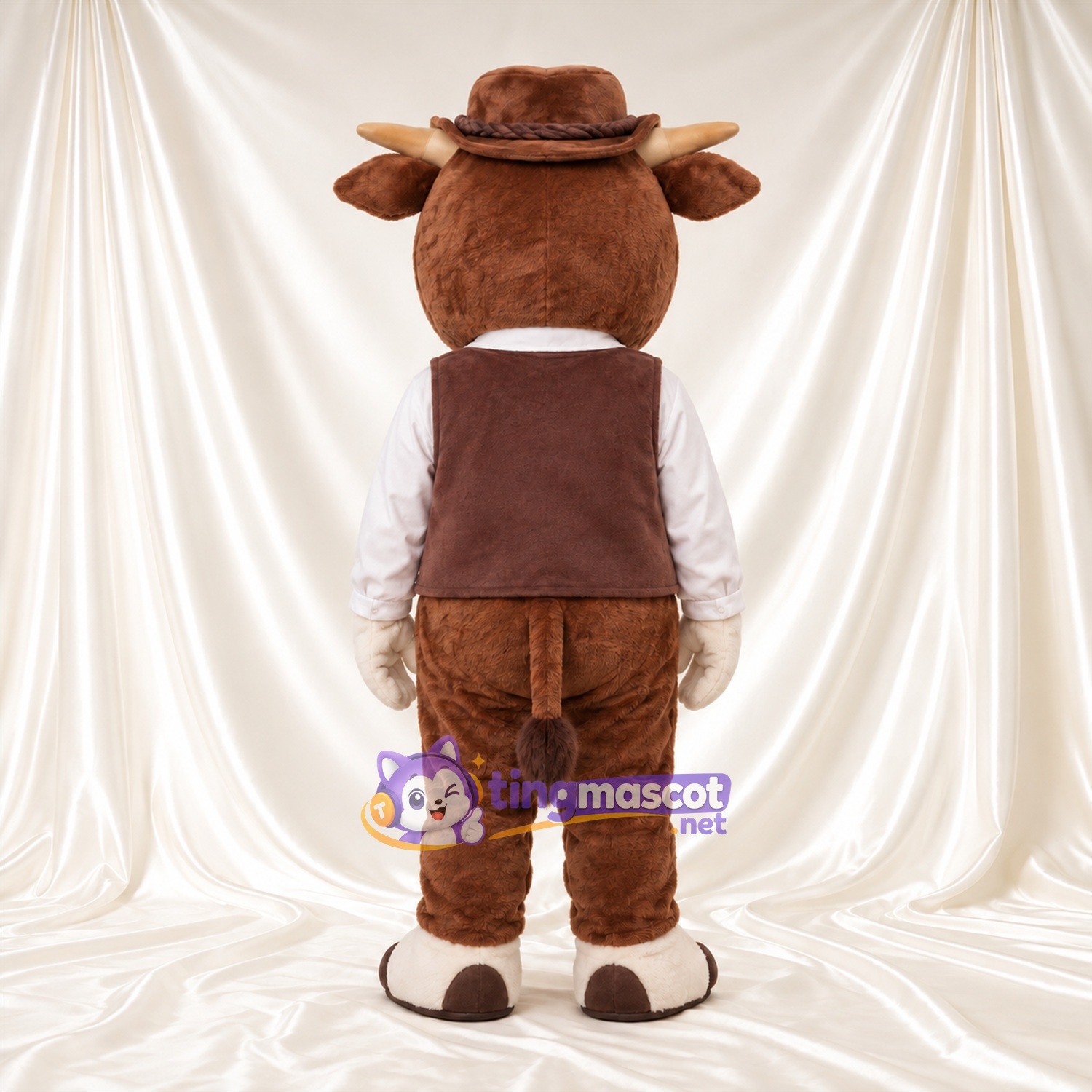 Costume de mascotte Vache – marron – Chapeau de cowboy (marron); Gilet Costume de mascotte Vache – marron – Chapeau de cowboy (marron); Gilet