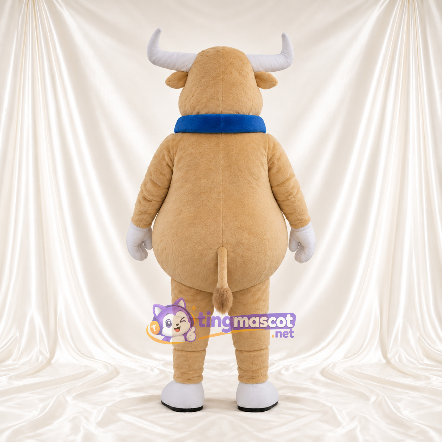 Costume de mascotte Vache – brun clair – Col (bleu) Costume de mascotte Vache – brun clair – Col (bleu)