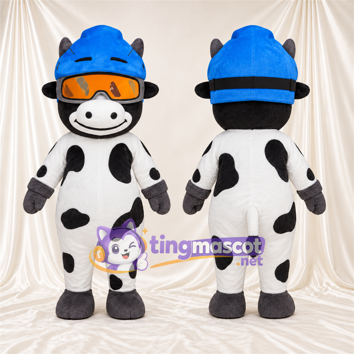 Black and White Cow Mascot Costume - Blue Helmet Orange Goggles Black and White Cow Mascot Costume - Blue Helmet Orange Goggles
