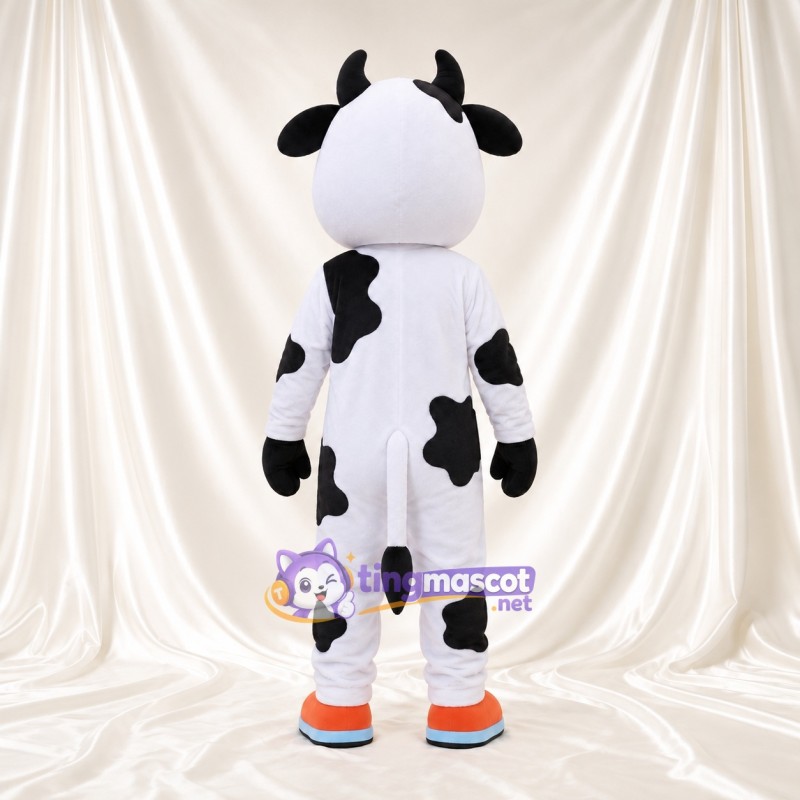 Black and White Cow Mascot Costume - Blue Eyes and Orange and Blue Shoes Black and White Cow Mascot Costume - Blue Eyes and Orange and Blue Shoes