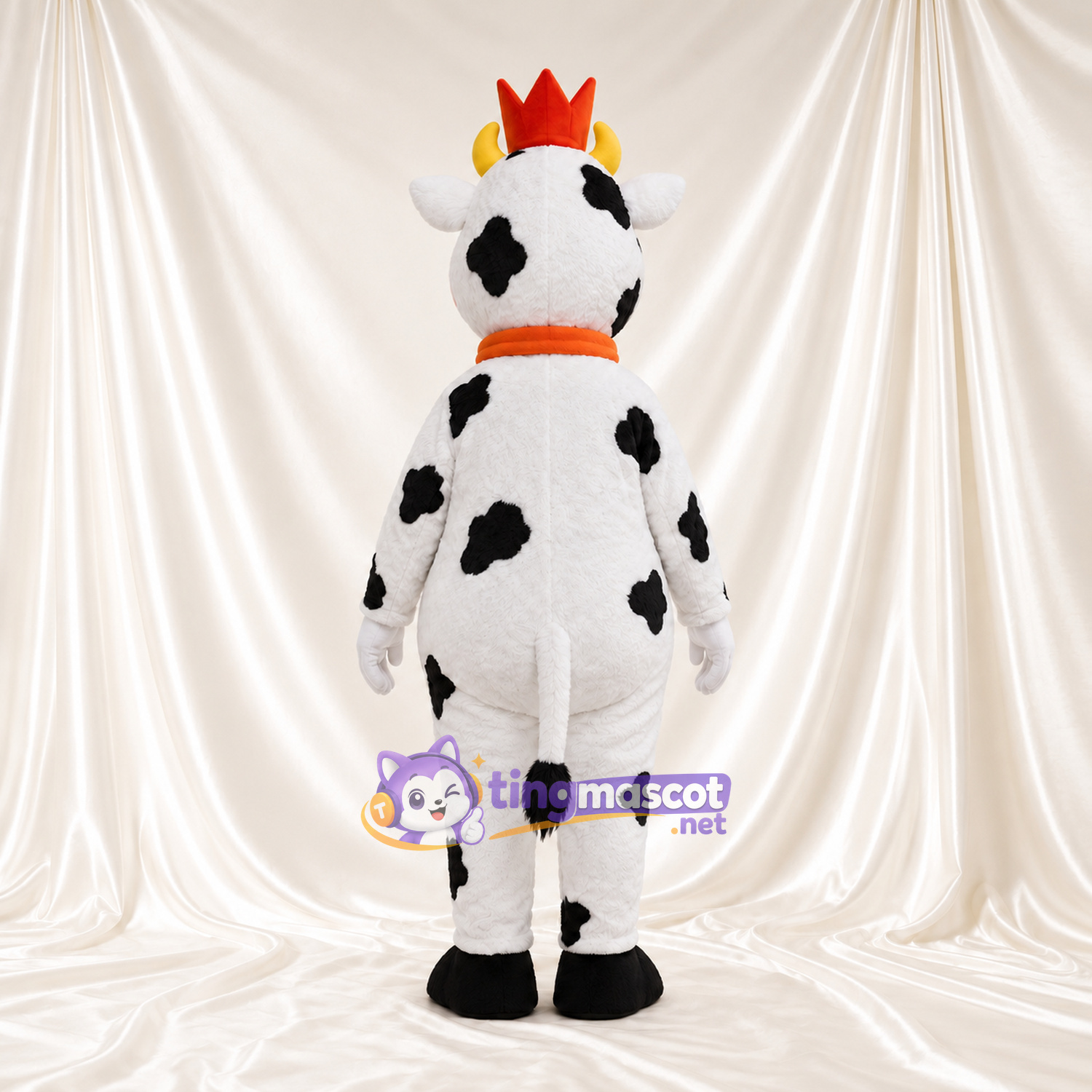 Black and White Cow Mascot Costume - Crown and Bell Collar, White Horns and Smiling Face Black and White Cow Mascot Costume - Crown and Bell Collar, White Horns and Smiling Face