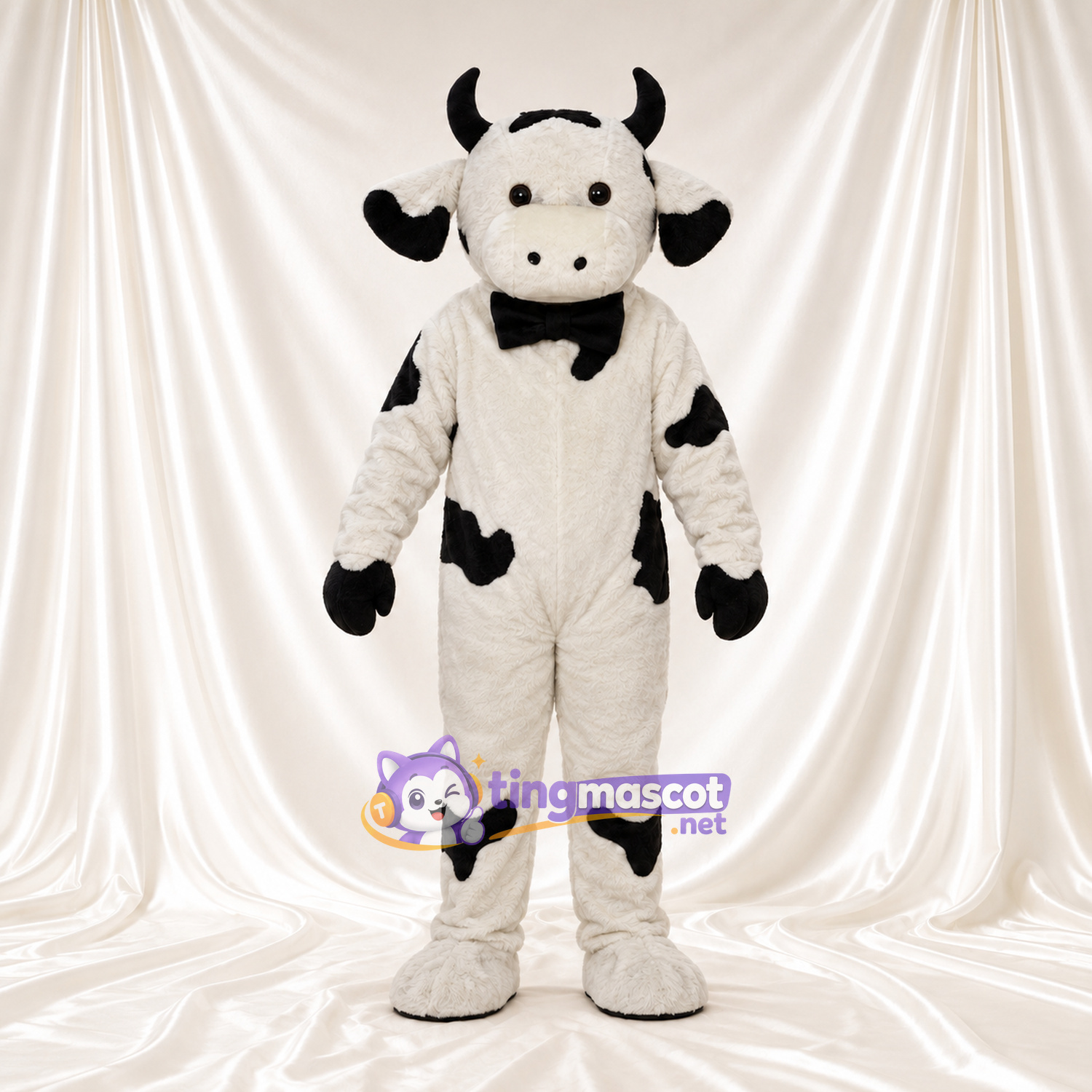 Black and White Cow Mascot Costume - Black Bow Tie Black and White Cow Mascot Costume - Black Bow Tie