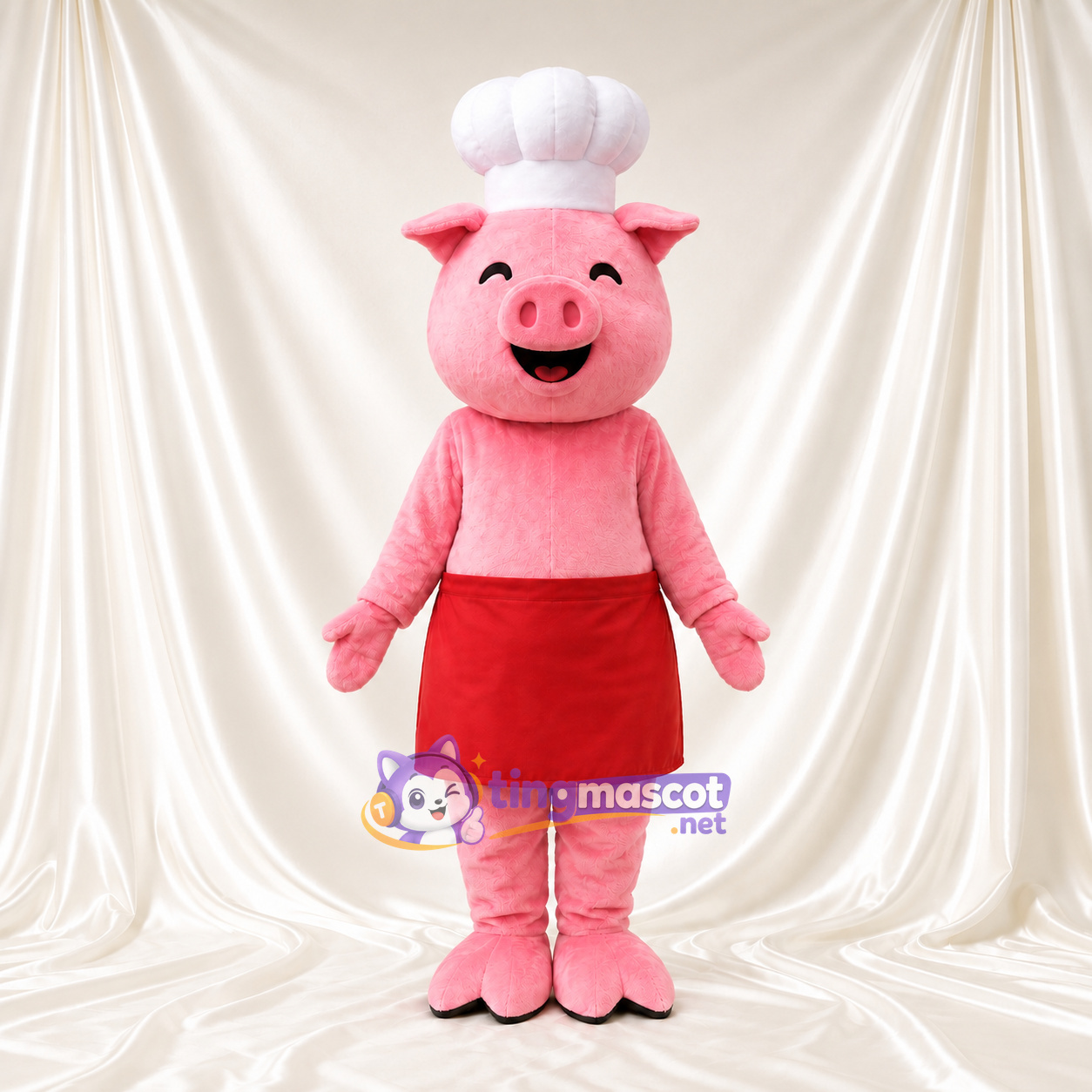 Costume de mascotte Cochon – rose – Toque de chef; Tablier (rouge) Costume de mascotte Cochon – rose – Toque de chef; Tablier (rouge)