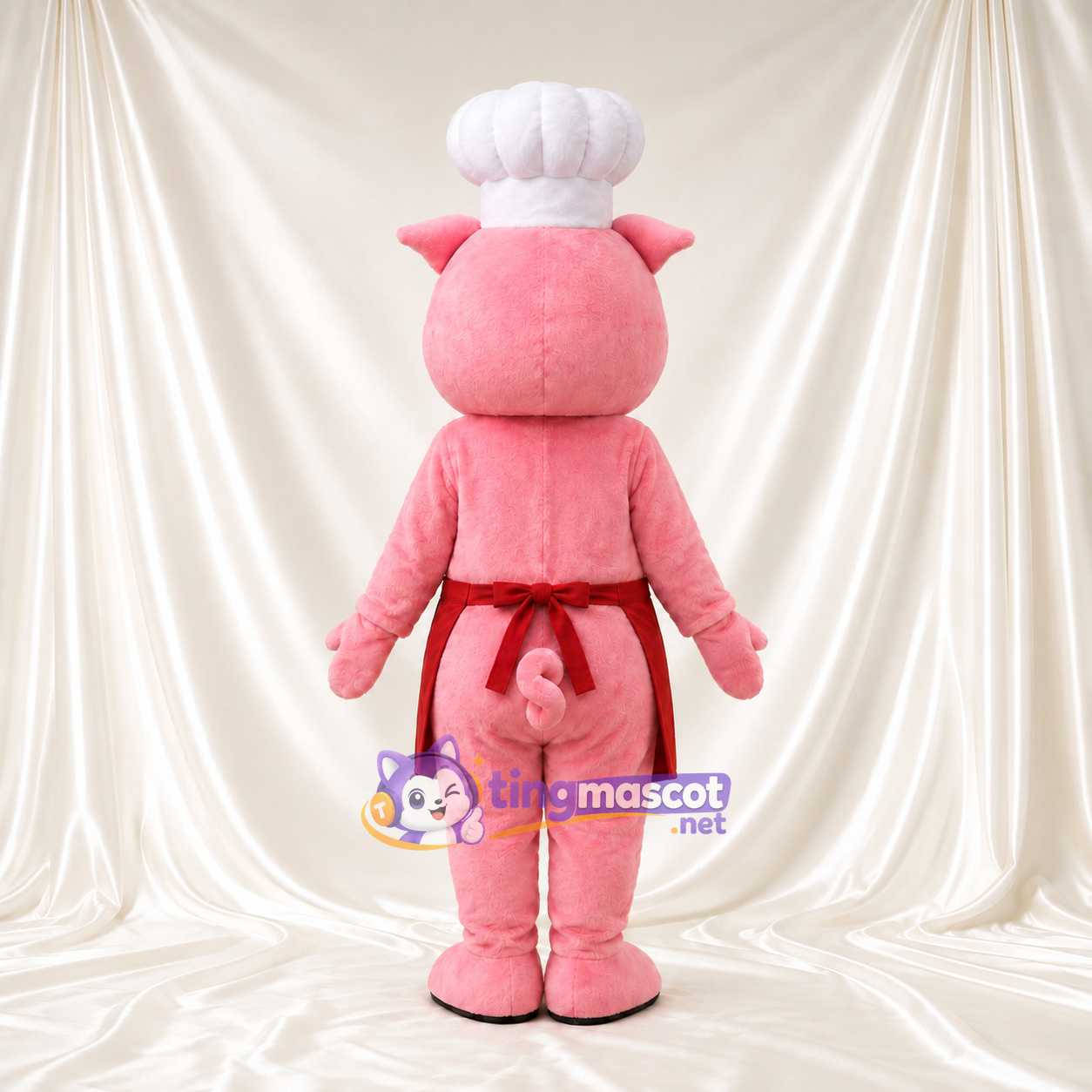 Costume de mascotte Cochon – rose – Toque de chef; Tablier (rouge) Costume de mascotte Cochon – rose – Toque de chef; Tablier (rouge)