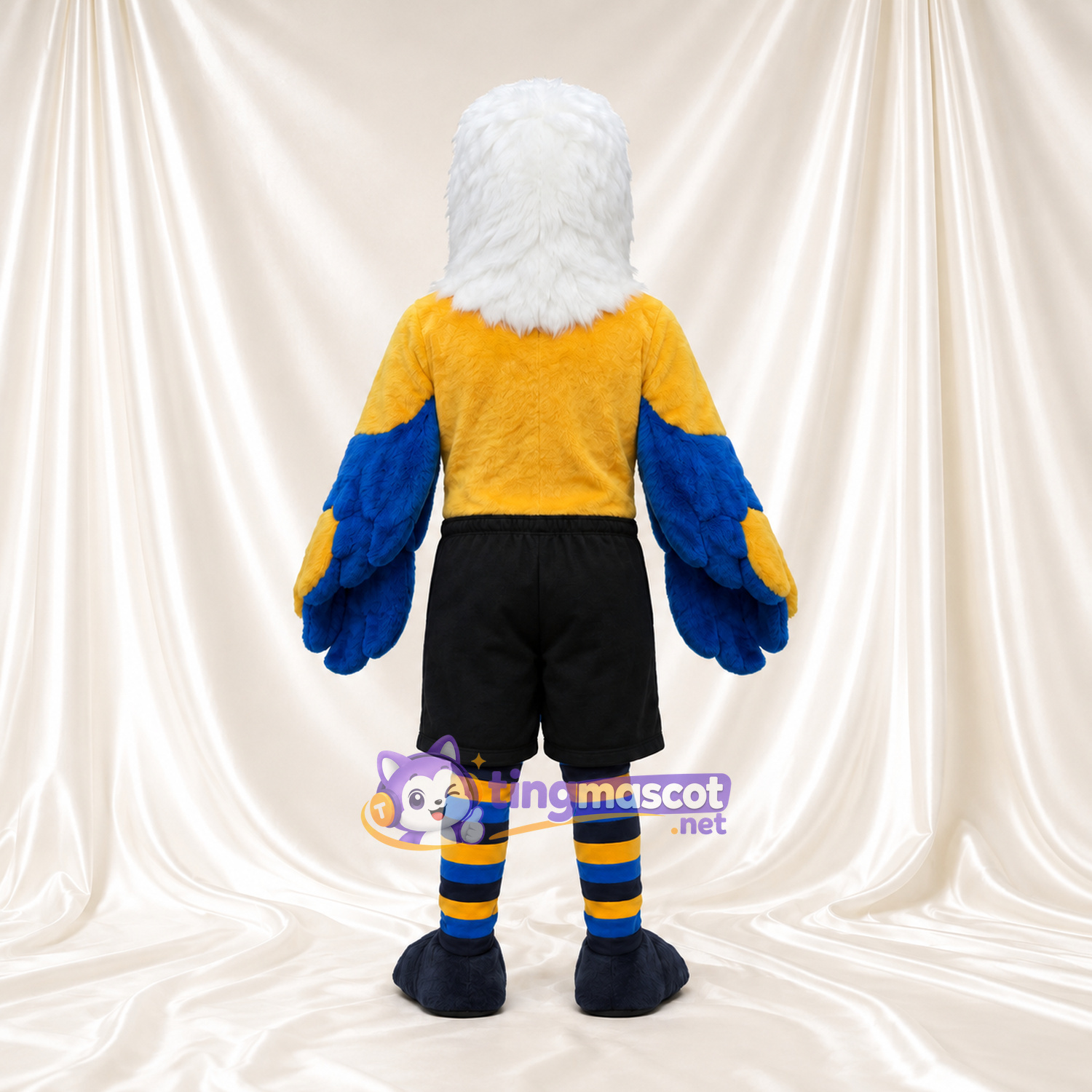 Maskottchenkostüm Weißkopfseeadler – blau – Hemd (gelb); Shorts (schwarz) Maskottchenkostüm Weißkopfseeadler – blau – Hemd (gelb); Shorts (schwarz)