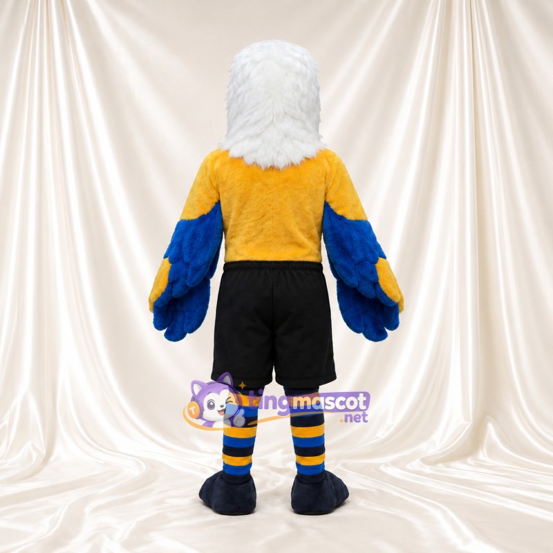 Maskottchenkostüm Weißkopfseeadler – blau – Hemd (gelb); Shorts (schwarz) Maskottchenkostüm Weißkopfseeadler – blau – Hemd (gelb); Shorts (schwarz)
