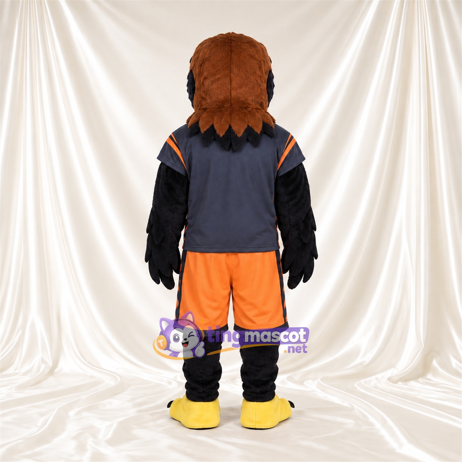 Costume de mascotte Faucon – marron – Maillot de sport (bleu marine); Short (orange) Costume de mascotte Faucon – marron – Maillot de sport (bleu marine); Short (orange)