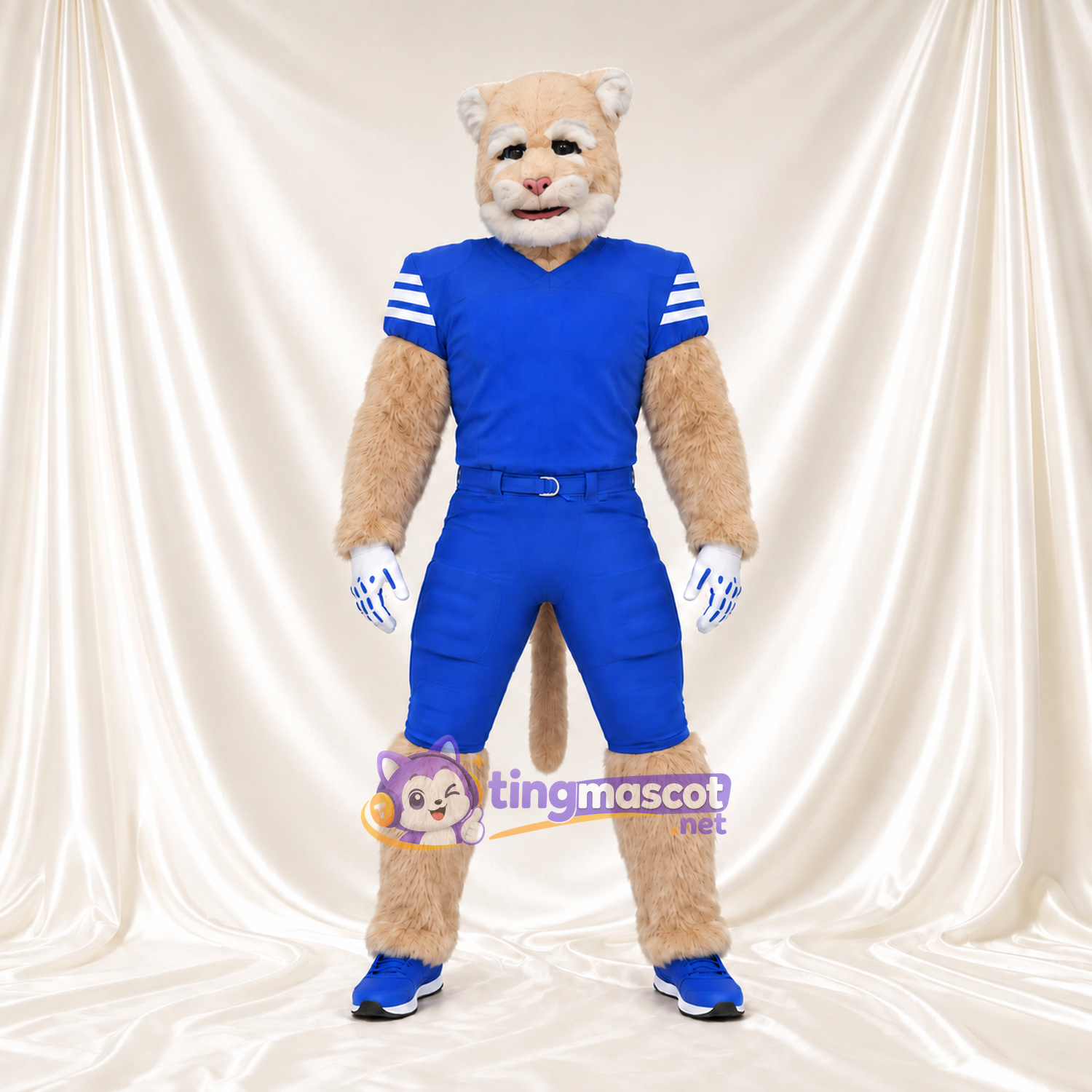 Beige Cougar Mascot Costume - Blue Sports Uniform and Blue Shoes Beige Cougar Mascot Costume - Blue Sports Uniform and Blue Shoes
