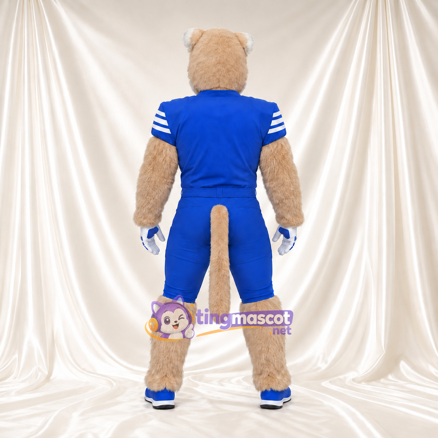 Beige Cougar Mascot Costume - Blue Sports Uniform and Blue Shoes Beige Cougar Mascot Costume - Blue Sports Uniform and Blue Shoes