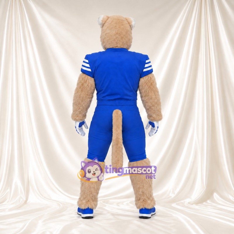 Beige Cougar Mascot Costume - Blue Sports Uniform and Blue Shoes Beige Cougar Mascot Costume - Blue Sports Uniform and Blue Shoes