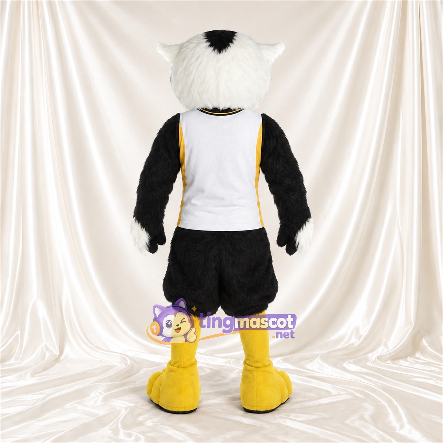 Black and White Owl Mascot Costume - White Sports Vest and Black Shorts Black and White Owl Mascot Costume - White Sports Vest and Black Shorts
