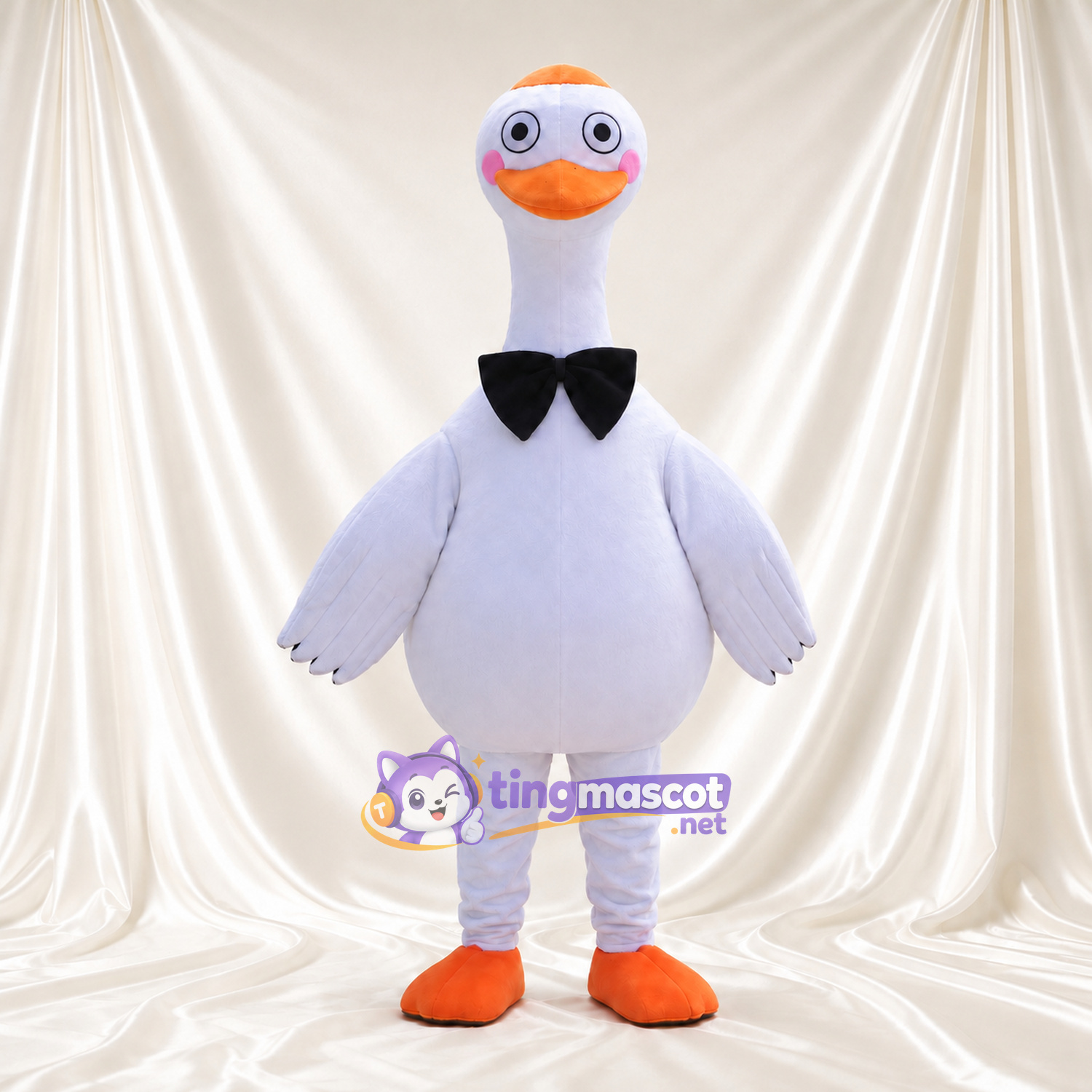 Maskottchenkostüm Gans – grau – Fliege (schwarz); Füße (orange) Maskottchenkostüm Gans – grau – Fliege (schwarz); Füße (orange)