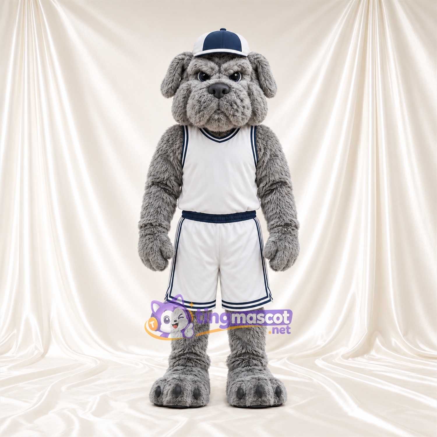 Costume de mascotte Bouledogue – gris – Casquette (bleu marine); Tenue de basket (blanc) Costume de mascotte Bouledogue – gris – Casquette (bleu marine); Tenue de basket (blanc)