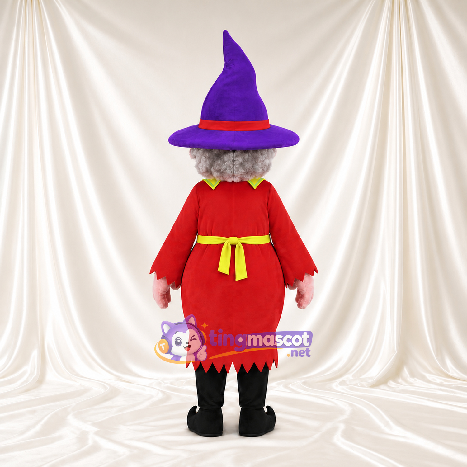 Maskottchenkostüm Hexe – wie abgebildet – Hut (violett); Kleid (rot); Schürze (gelb)