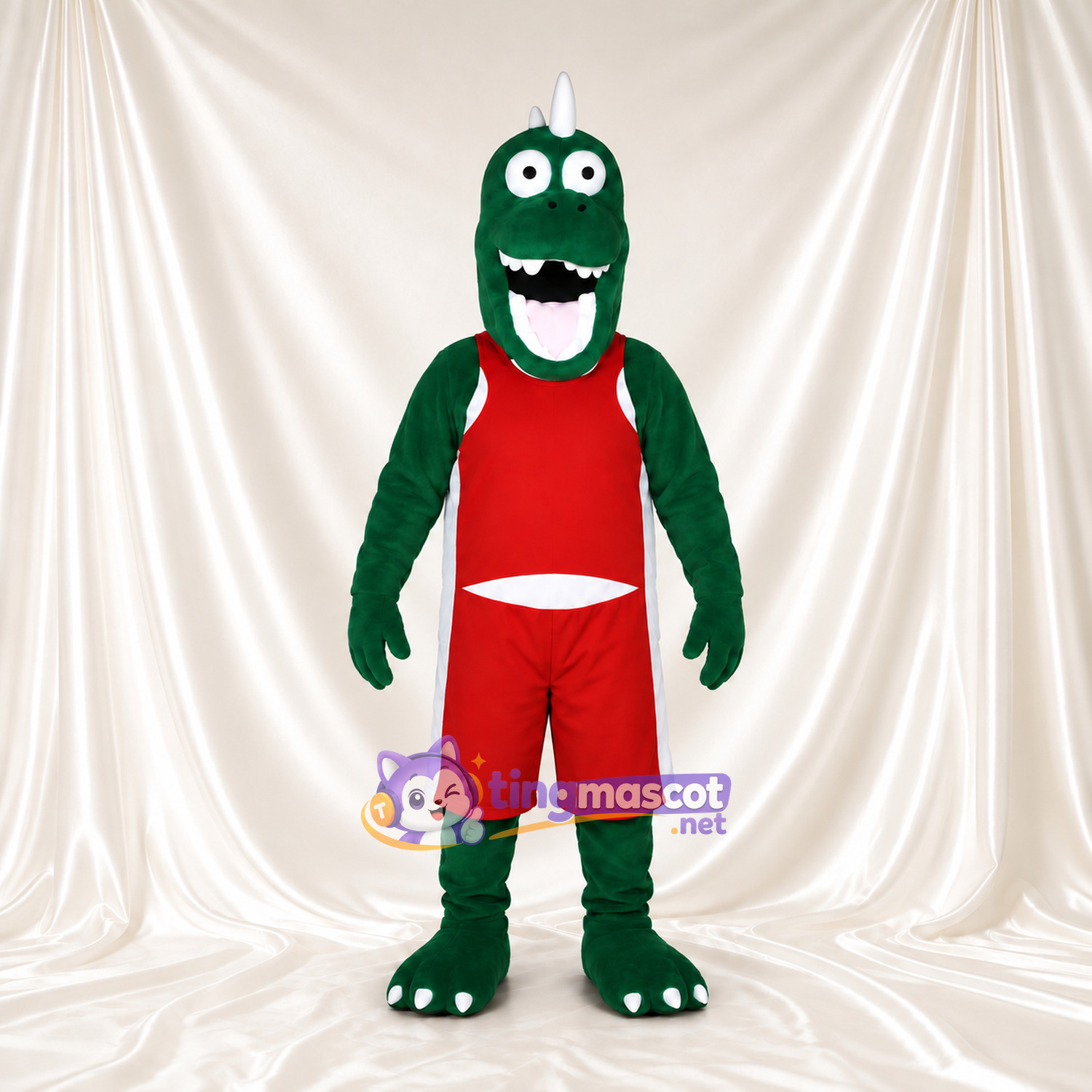 Costume de mascotte Dinosaure – vert – Tenue de basket (rouge); Sourire (large) Costume de mascotte Dinosaure – vert – Tenue de basket (rouge); Sourire (large)