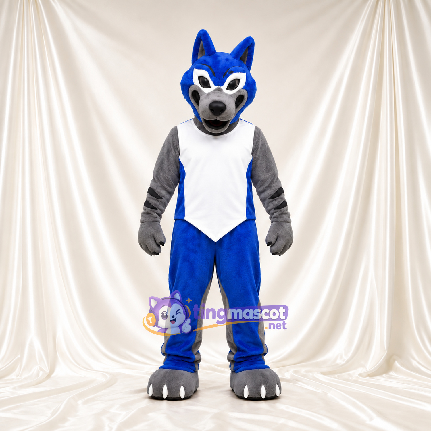 Costume de mascotte Loup – bleu / gris – Gilet de sport (blanc); Pantalon (bleu) Costume de mascotte Loup – bleu / gris – Gilet de sport (blanc); Pantalon (bleu)