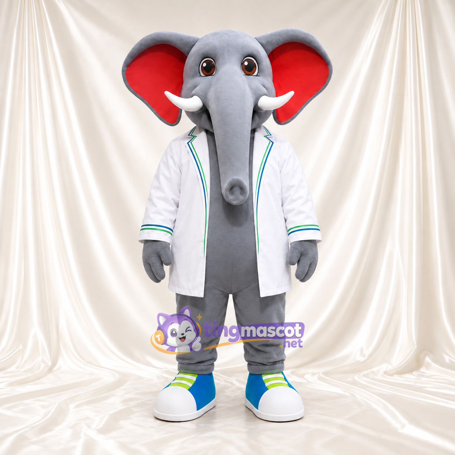 Costume de mascotte Éléphant – gris – Chemise (blanc); Baskets (bleu) Costume de mascotte Éléphant – gris – Chemise (blanc); Baskets (bleu)