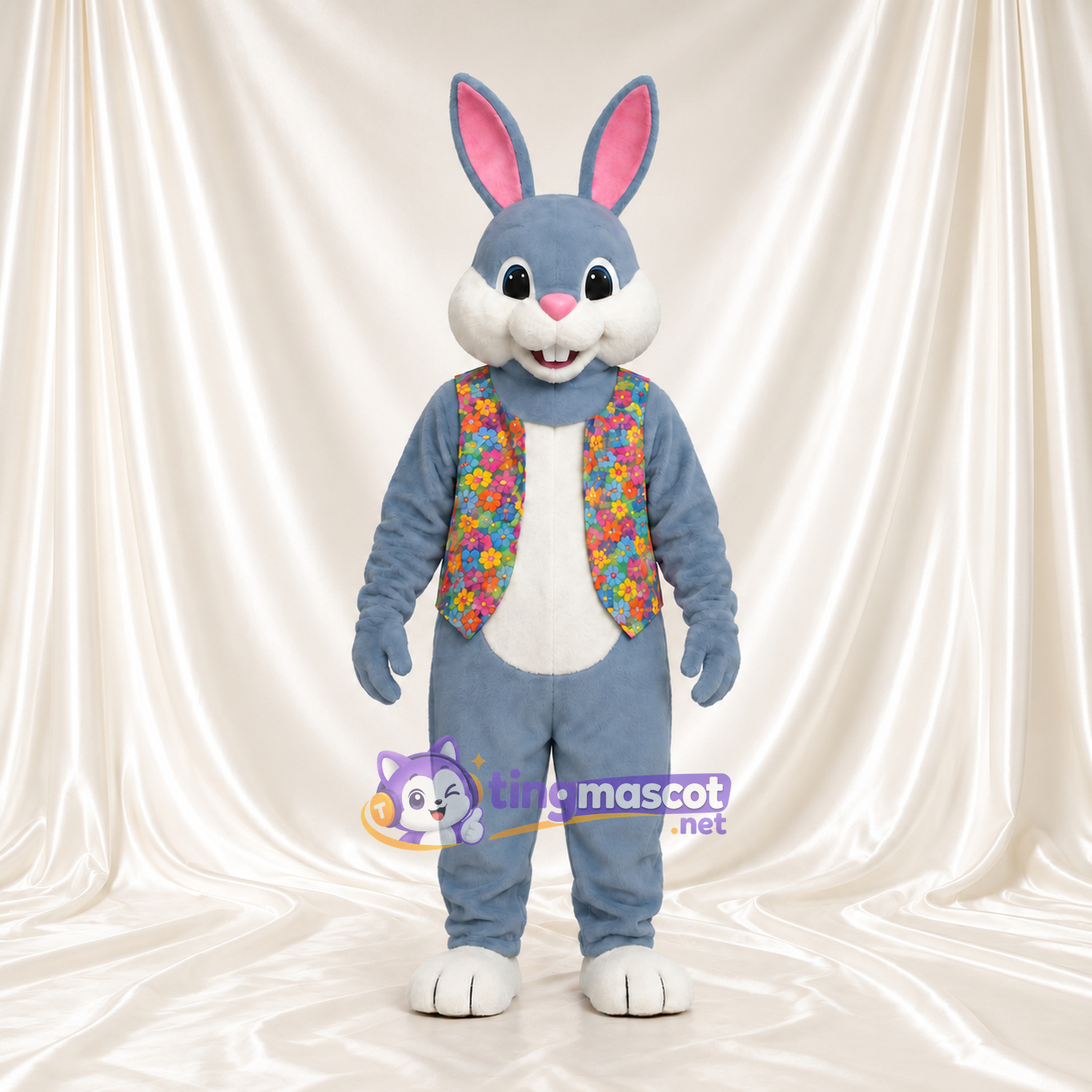 Maskottchenkostüm Hase – blau / grau – Weste (bunt, mit Blumenmuster) Maskottchenkostüm Hase – blau / grau – Weste (bunt, mit Blumenmuster)