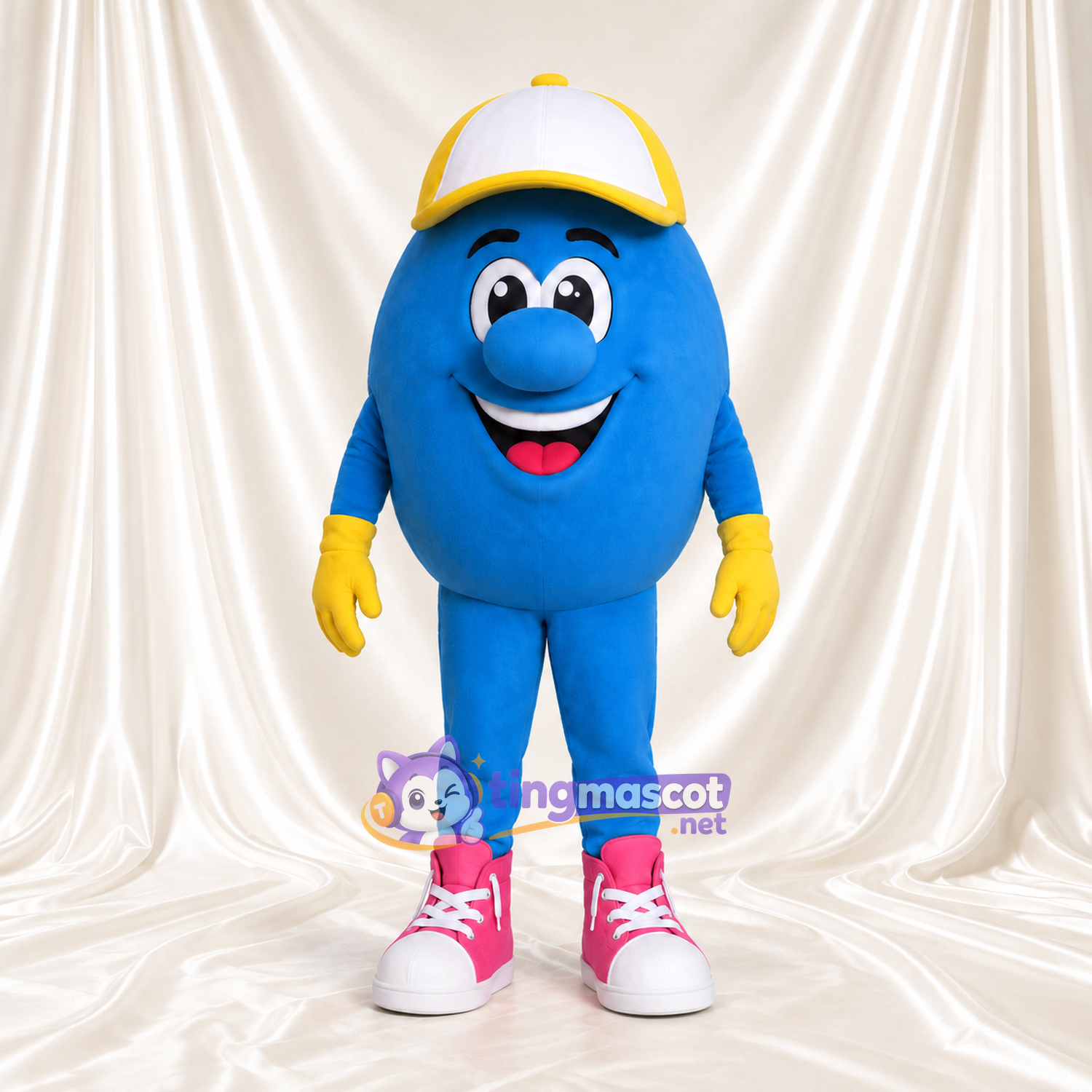 Costume de mascotte Personnage rond – bleu – Casquette (blanc); Baskets (rose) Costume de mascotte Personnage rond – bleu – Casquette (blanc); Baskets (rose)